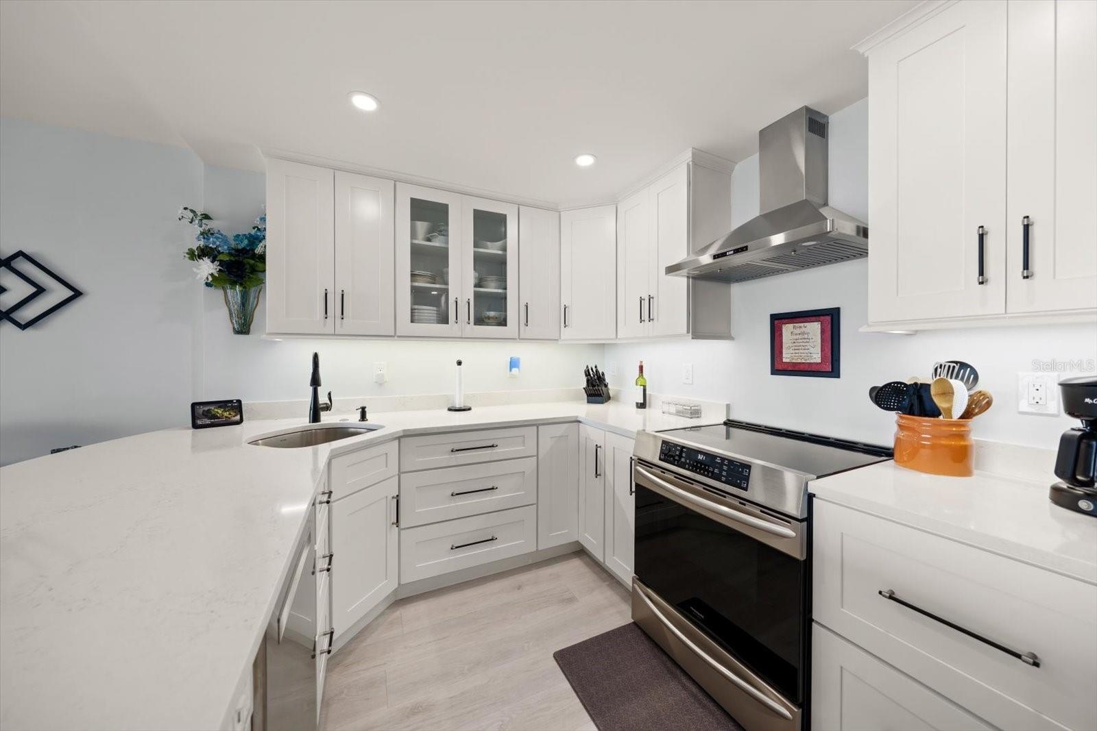 Well appointed kitchen with oversized island; perfect for dining & entertaining.