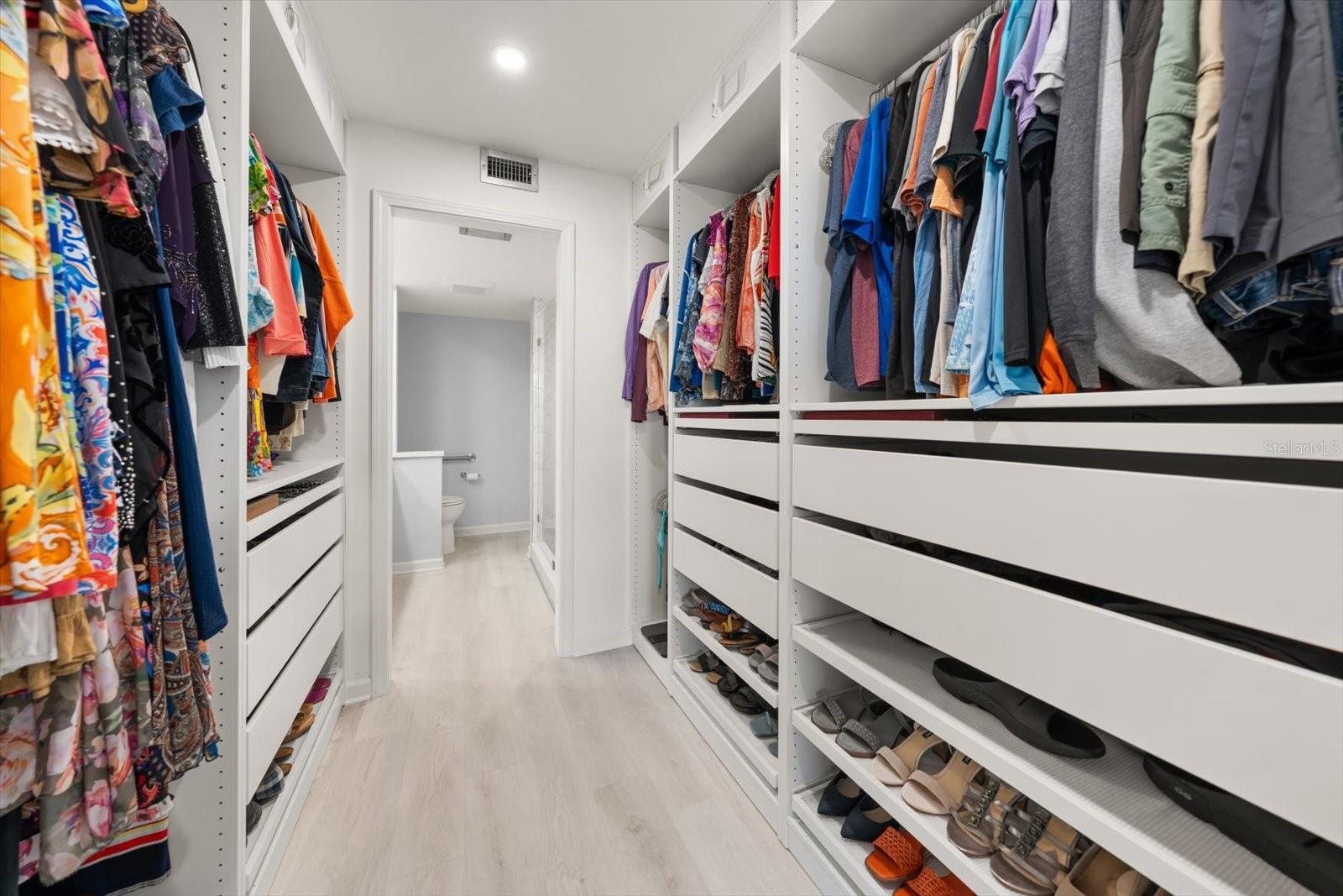 Fully updated closet with smart custom closet design.