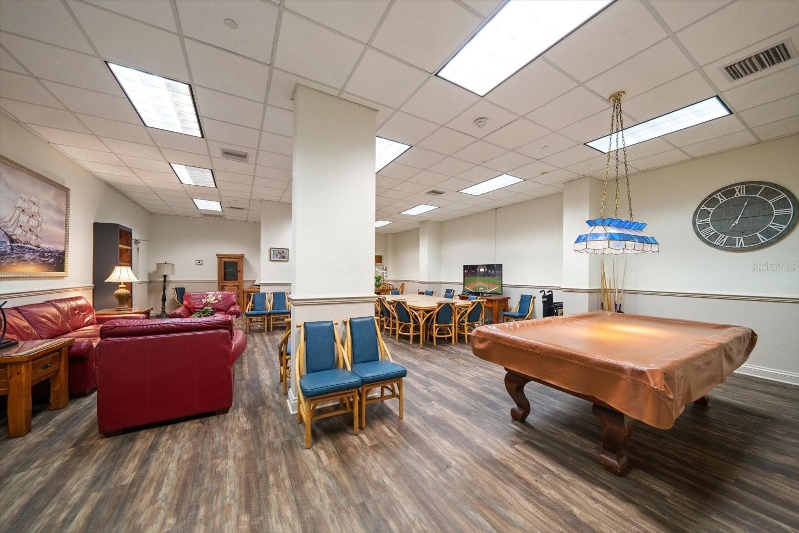 Entertain your guests or yourselves here in the community room.