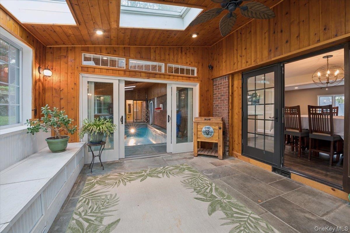 The ultimate in entertaining. Heated three season room leading to an enclosed pool.