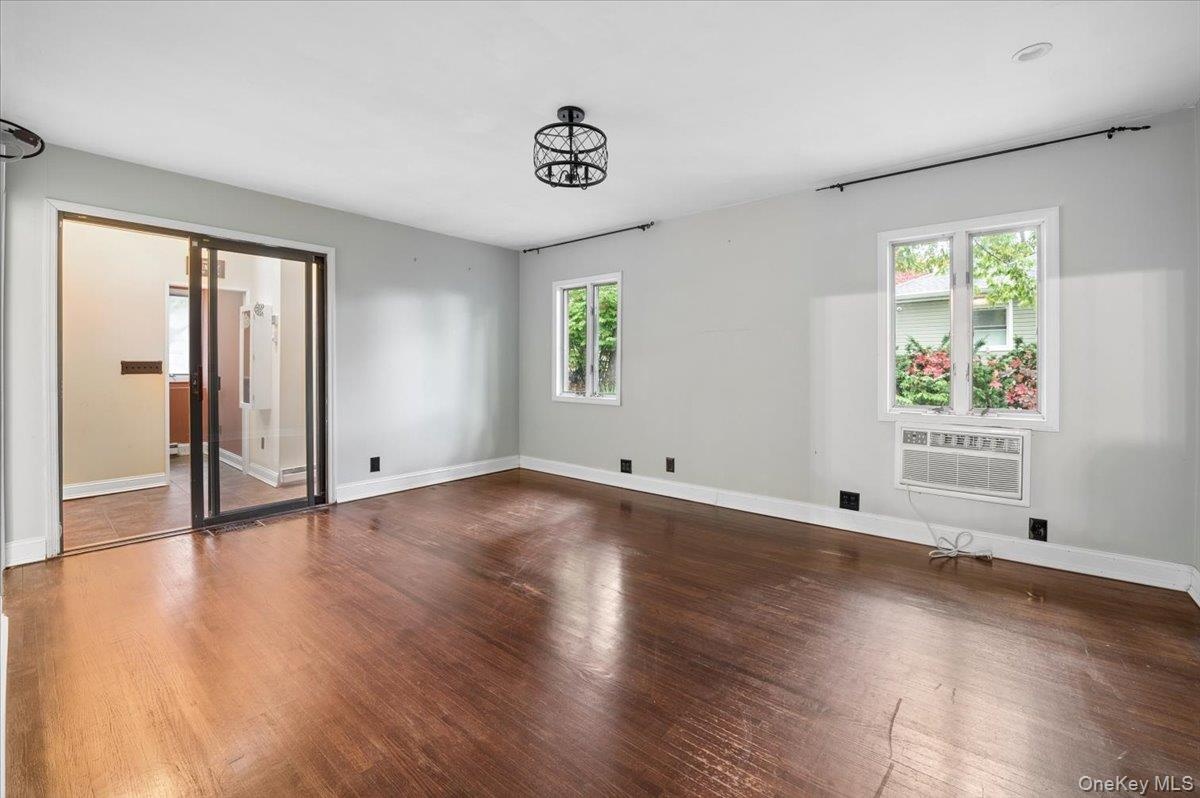 Primary bedroom leads to laundry, a walk-in closet and additional pool access.