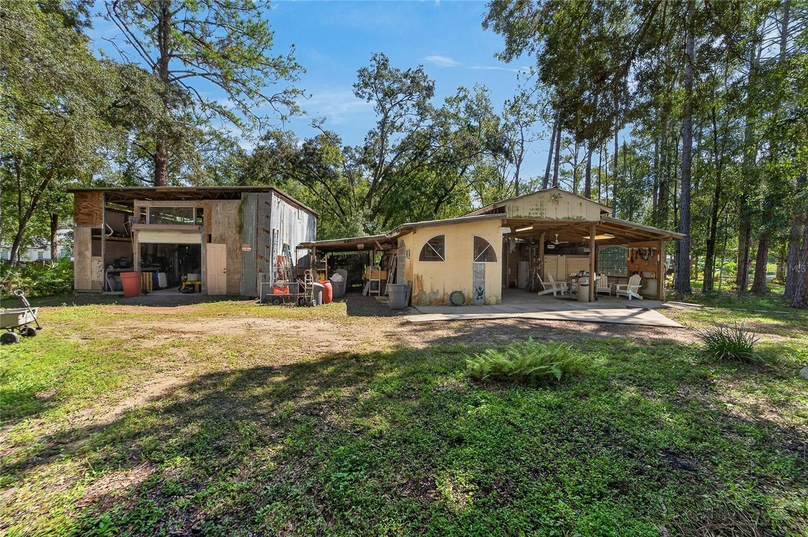 Out buildings that can be shop, storage or barn. Livestock are welcome here.
