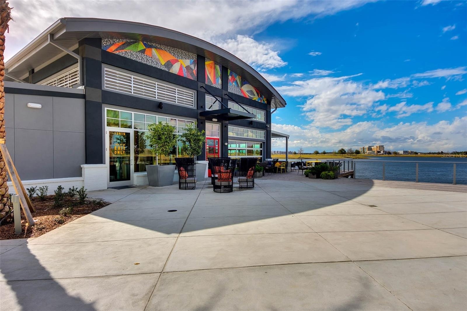 Modern amenity center with open patio space, a highlight of Lake Nona community living.