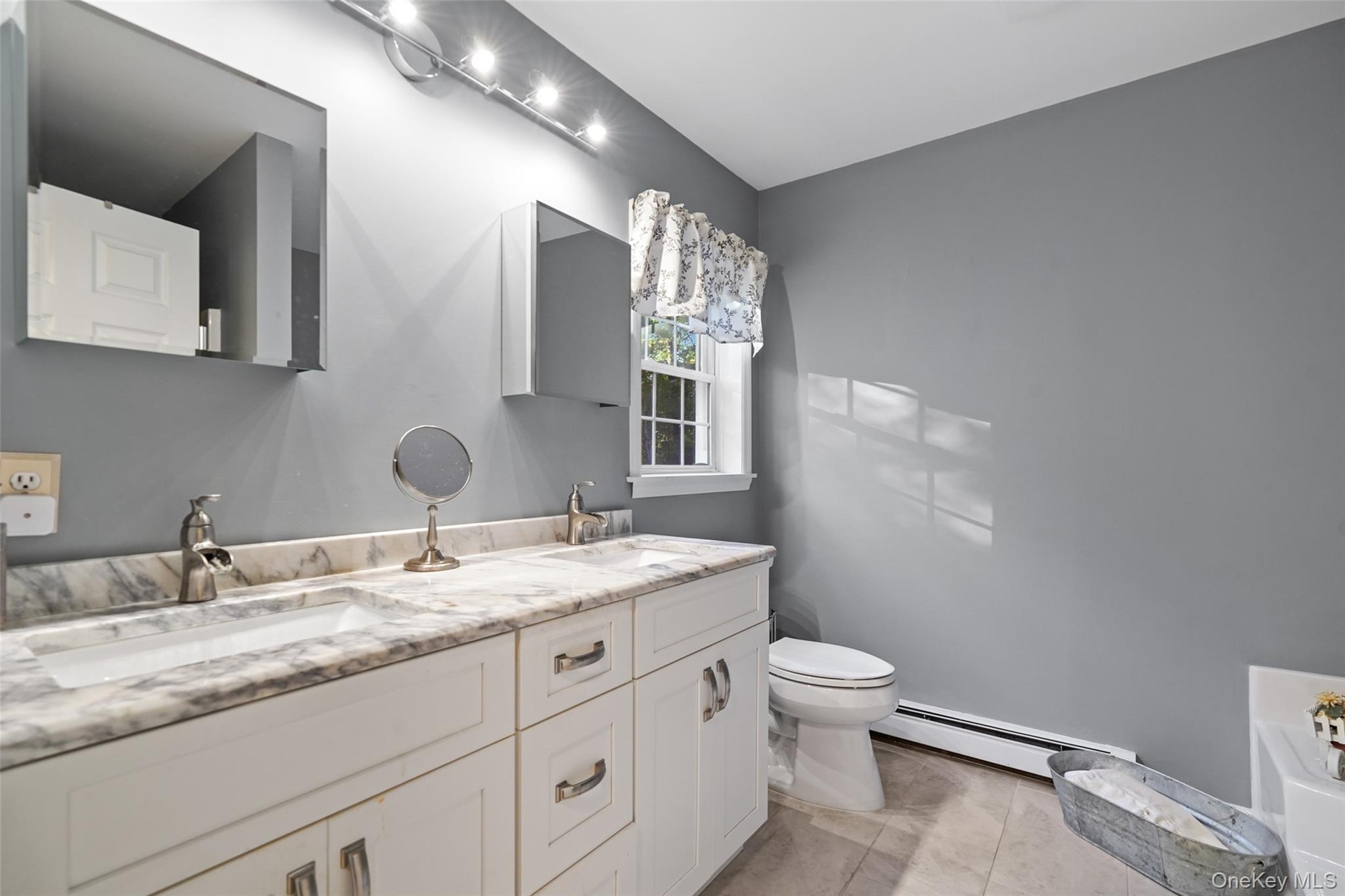 Primary Bathroom with Tub and Shower