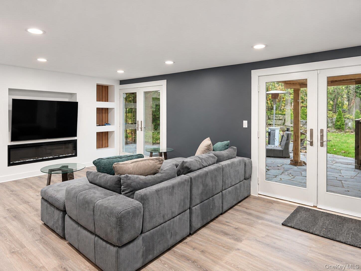 Lower level. French Door open to patio and yard
