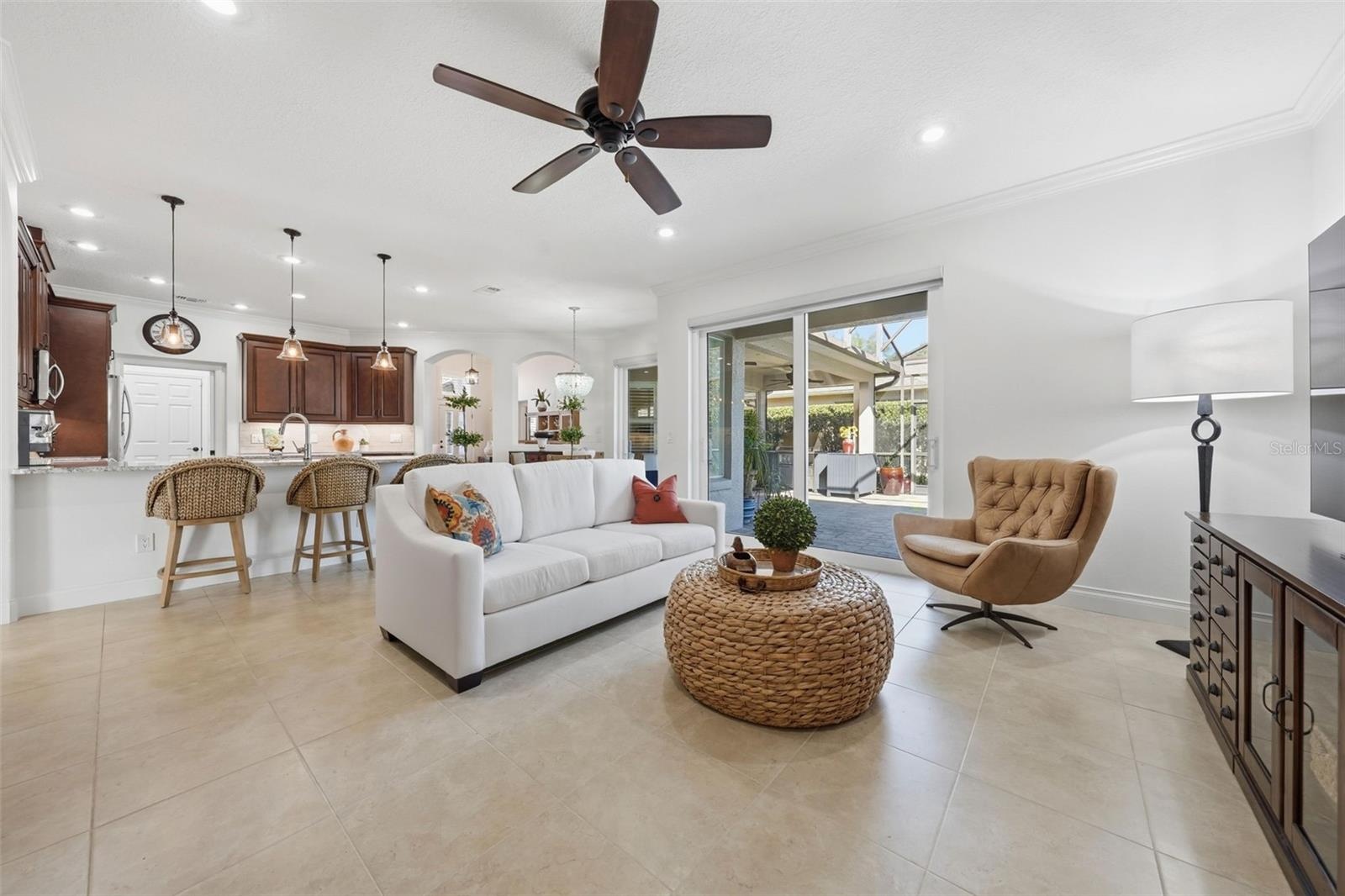FAMILY ROOM WITH NEW SLIDING DOORS WITH MOTORIZED BLINDS