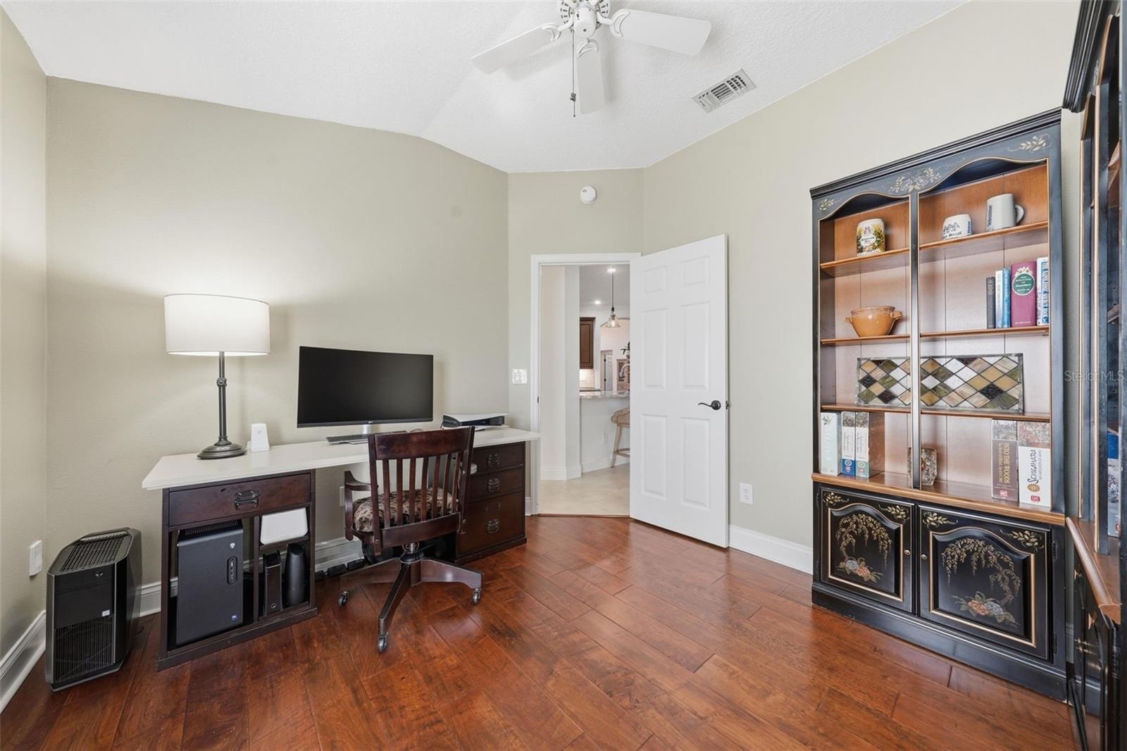 BEDROOM BEING USED AS AN OFFICE CURRENTLY with ENGINEERED HARDWOOD FLOORING