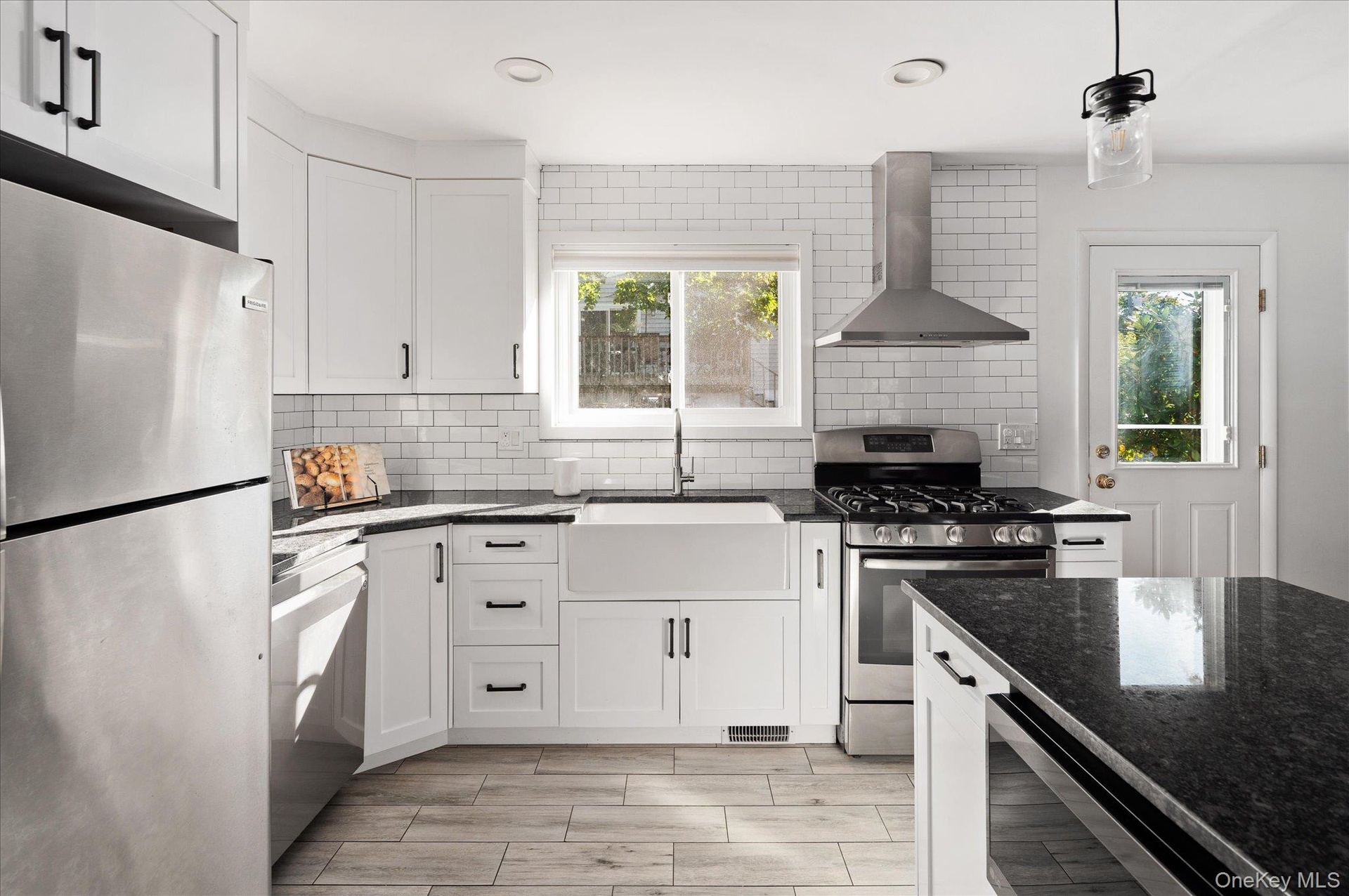 Natural light plays off the stainless appliances.
