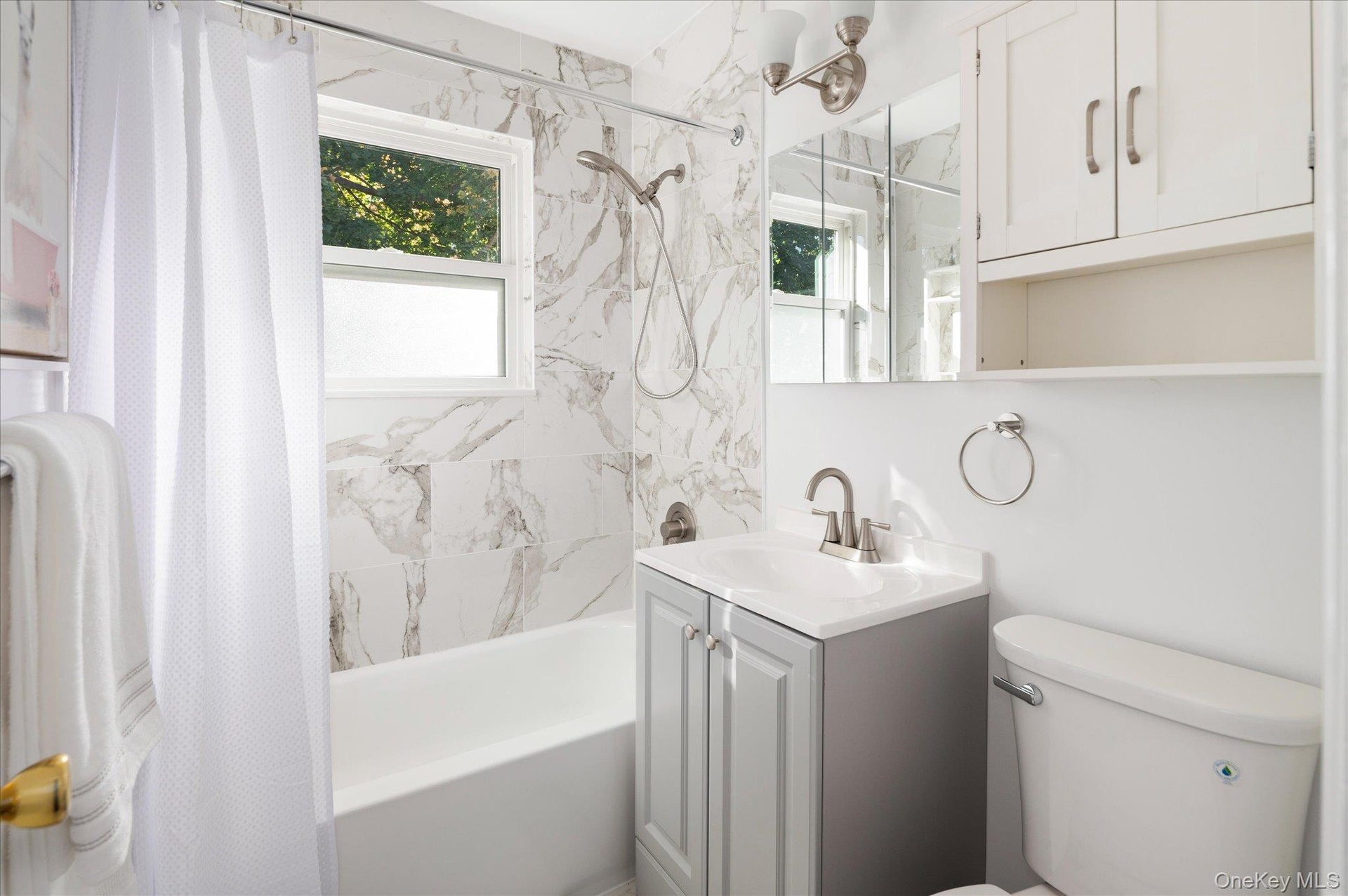 JUST renovated - new full bath