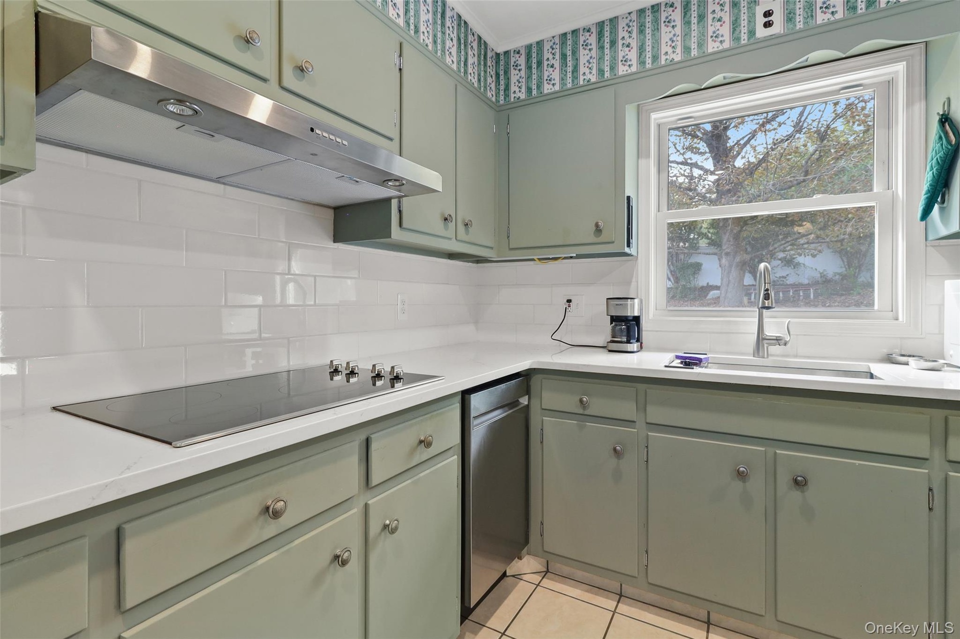 Kitchen with white subway tile backsplash