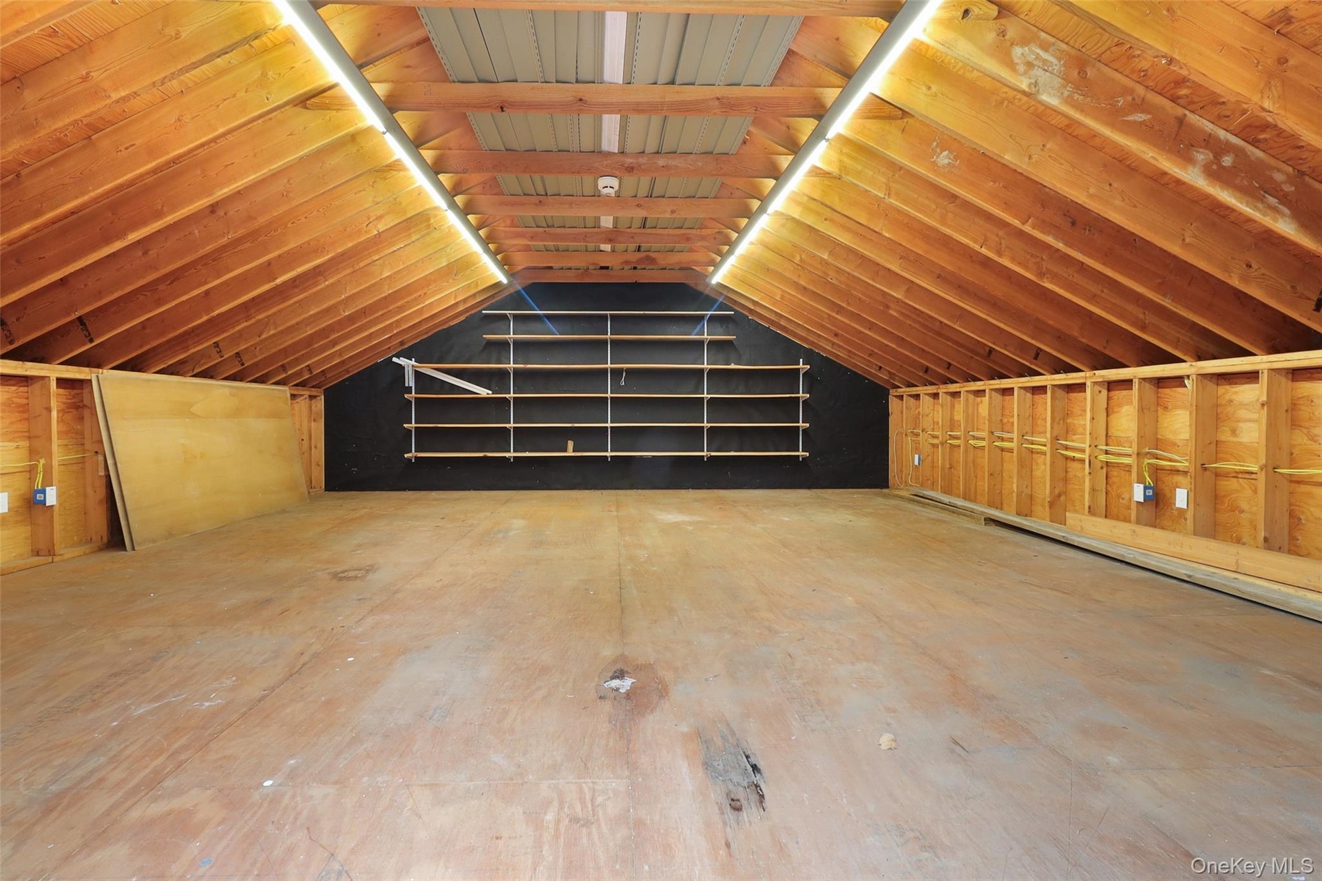 This storage area/loft is located on top of the new two car garage