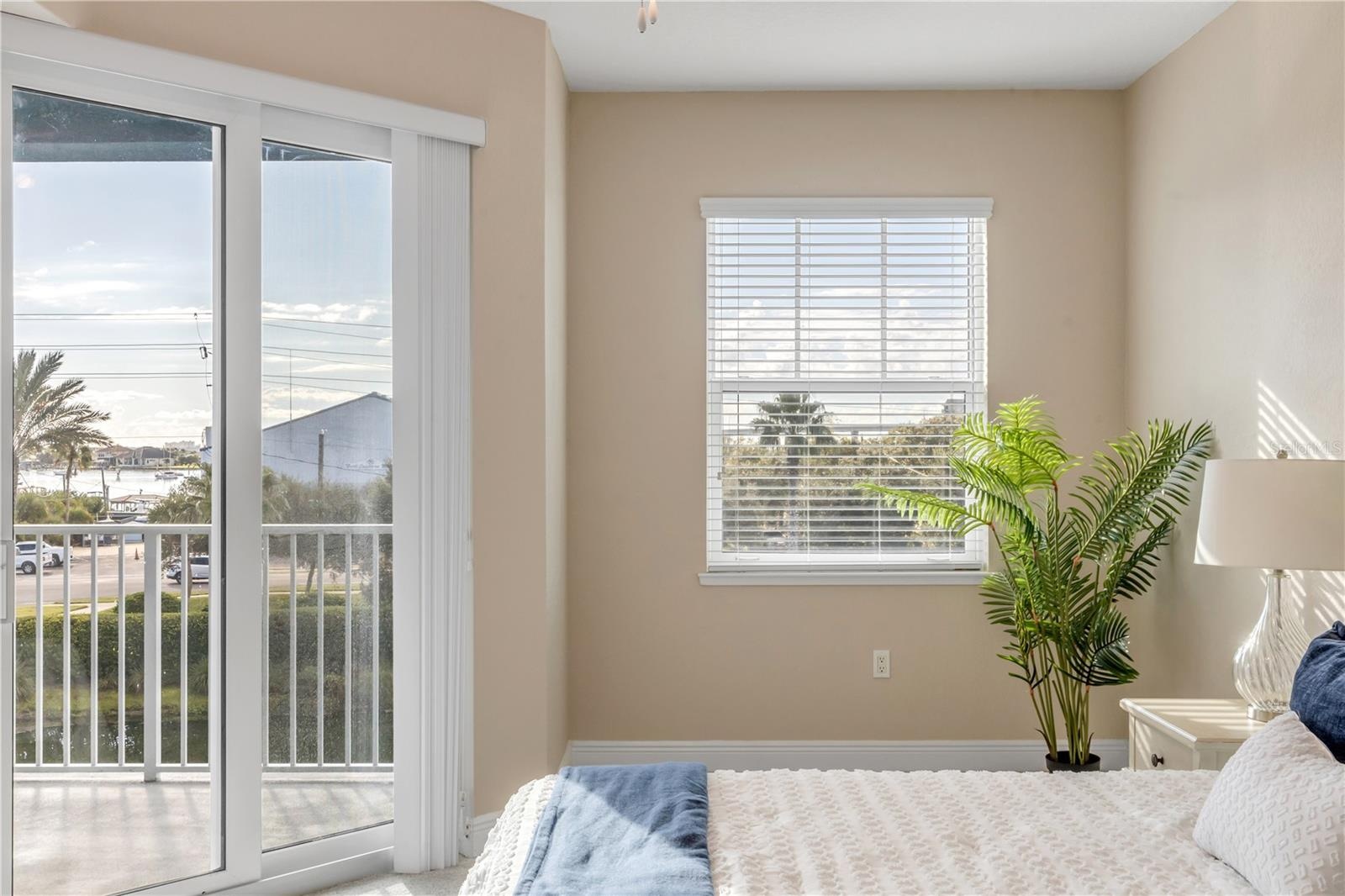 Primary Bedroom with slider to the back patio
