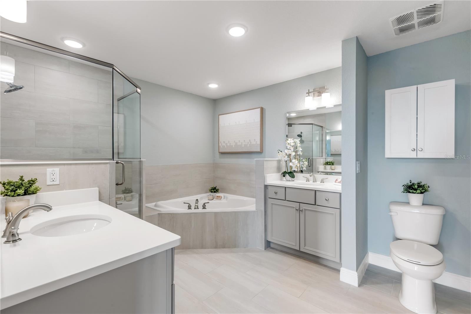 Primary bathroom with dual vanities