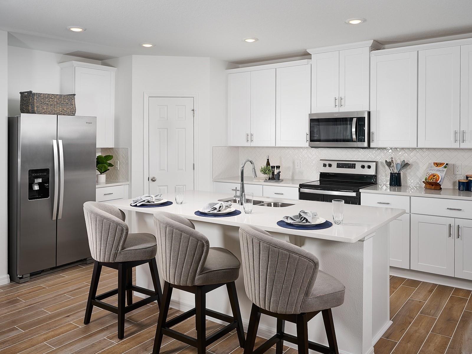 Photo is not of the actual home, but is an inspirational photo of builder’s model home and may depict options, furnishings, and/or decorator features 