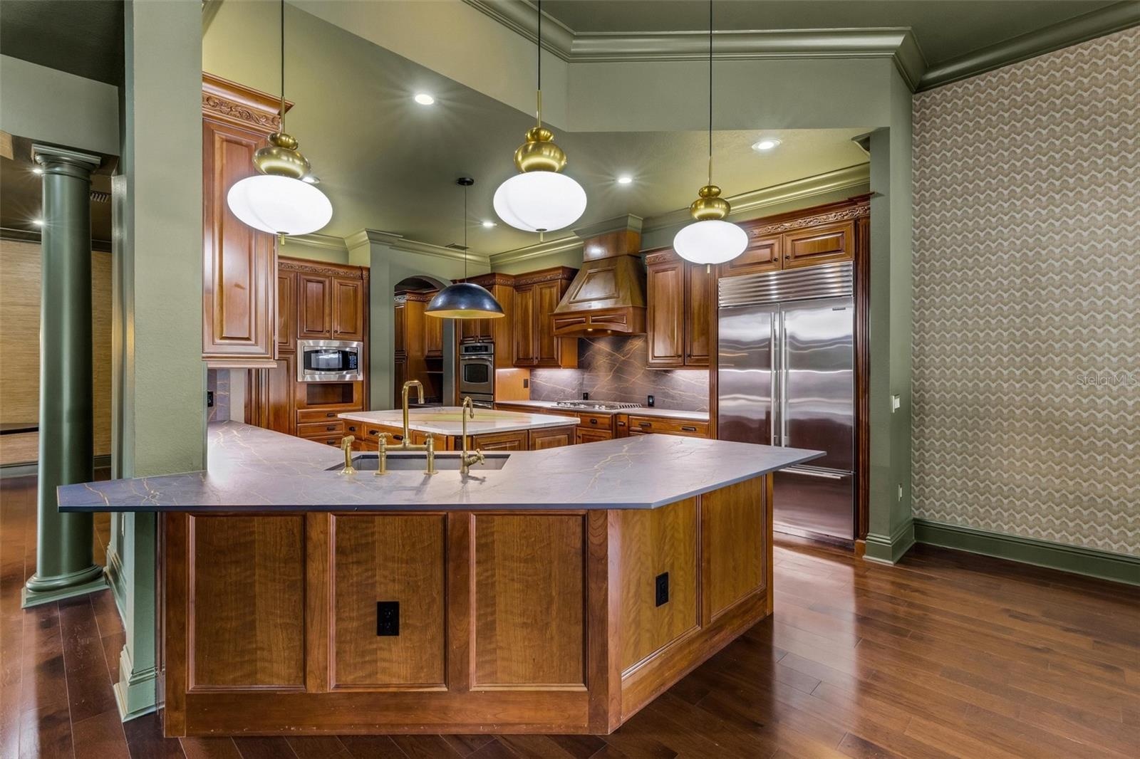 The custom Dekton countertops are made by Cosentino that blends minerals used in glass, porcelain and quartz forming an ultra durable material that is