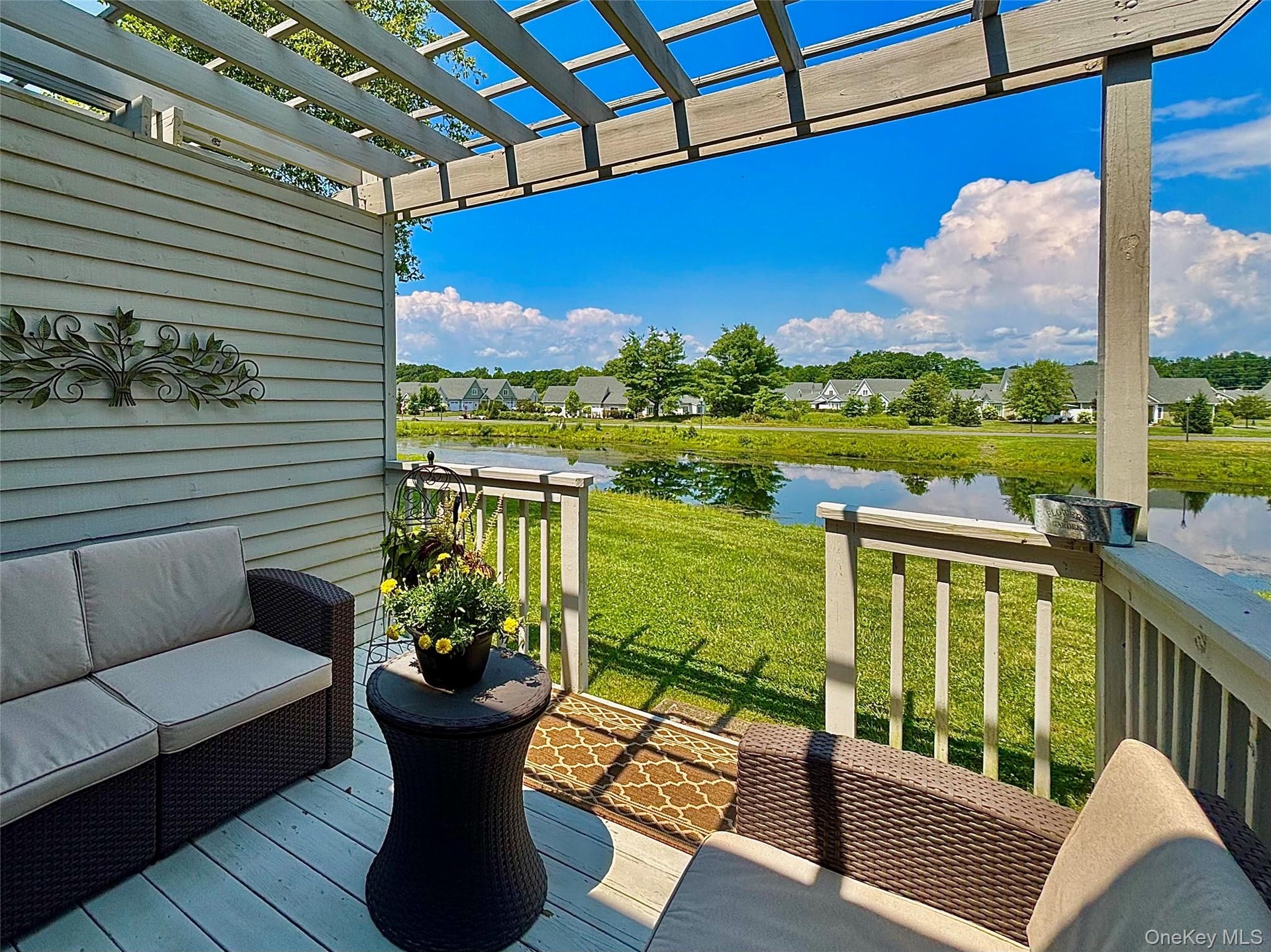 Comfortable deck with beautiful pond view