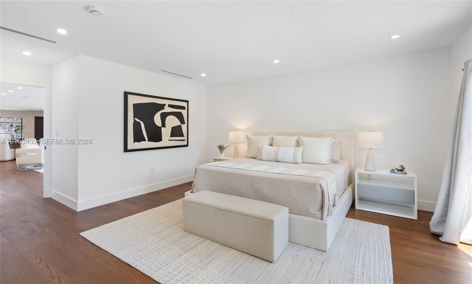 Bedroom featuring wood-finish flooring, recessed lighting, and smooth-finish walls