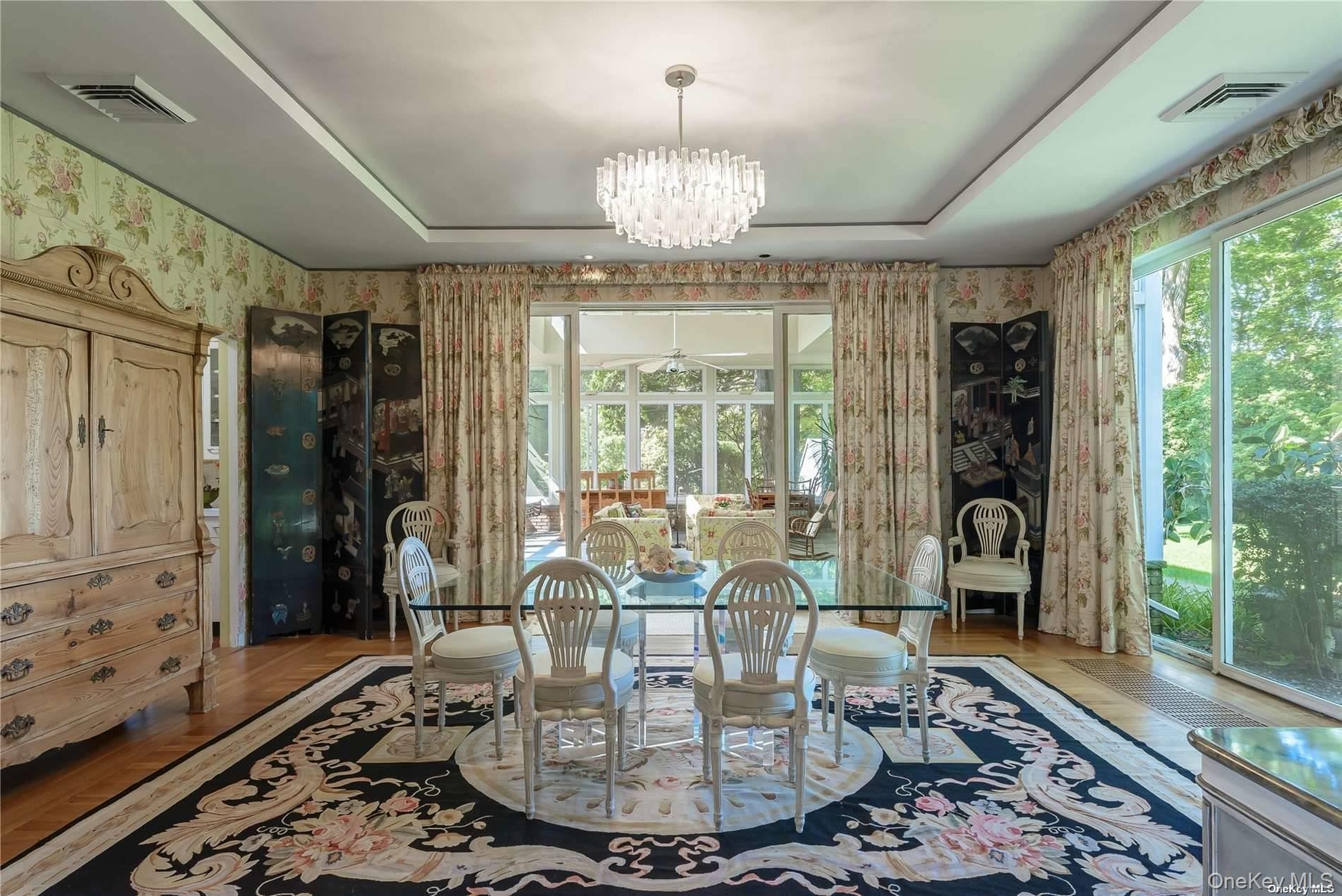 Formal Dining Room Overlooking Patio. Leads to Solarium.