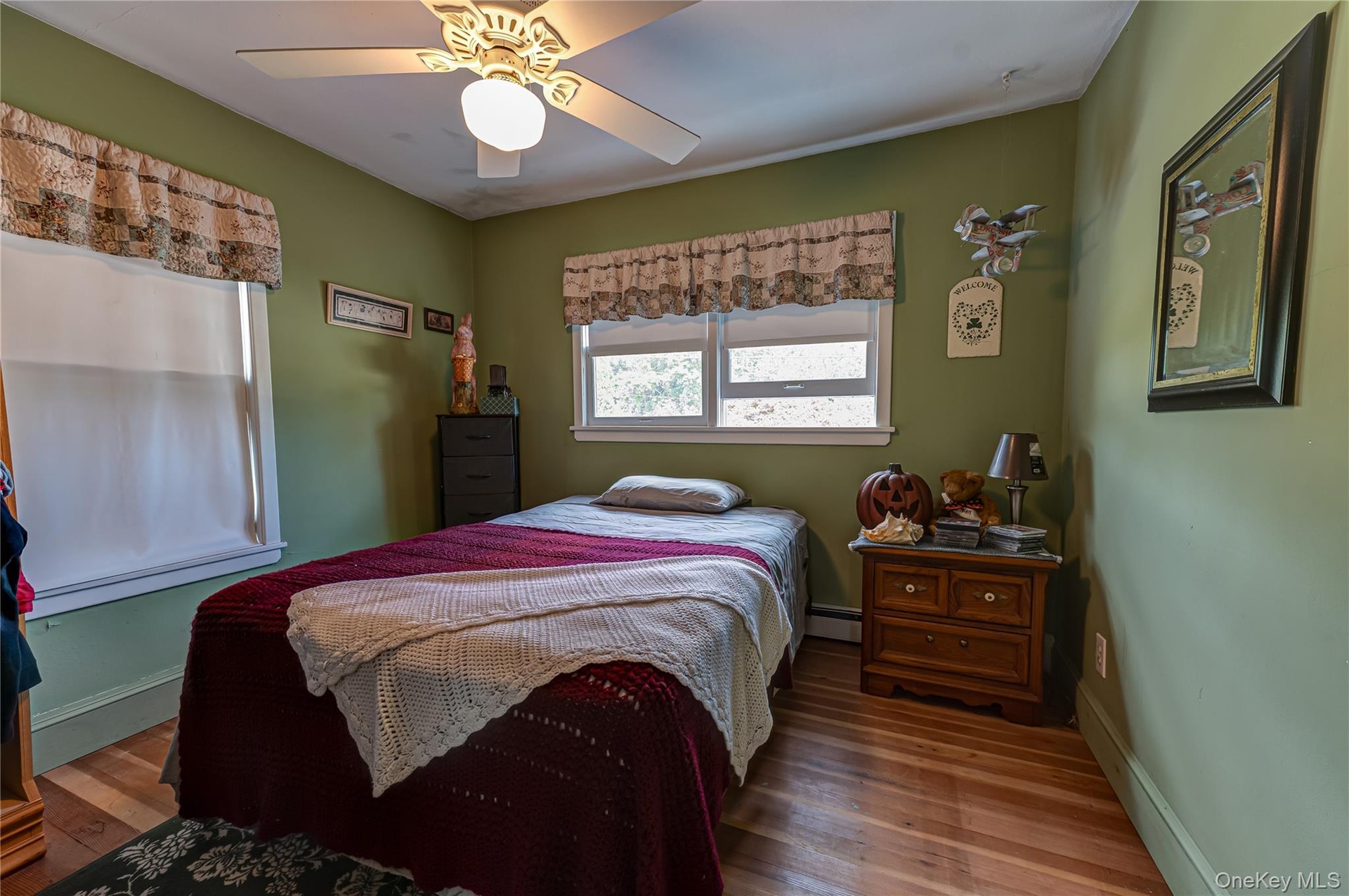 Second bedroom with hardwood floors