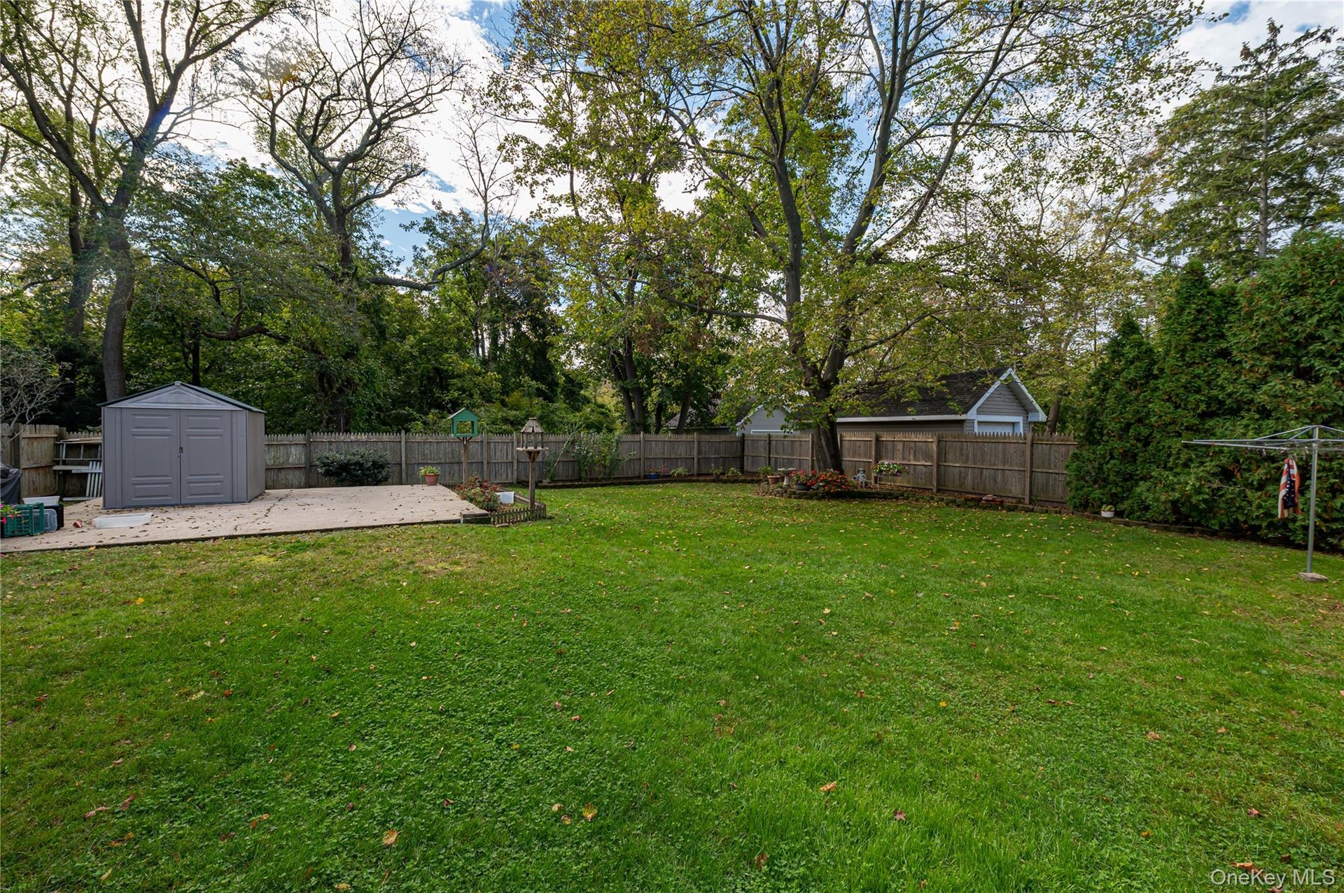 Shed is a gift. Sits atop a cement pad which was installed to accommodate a 2 car garage that was demolished in approximately 1986. Permit for structu