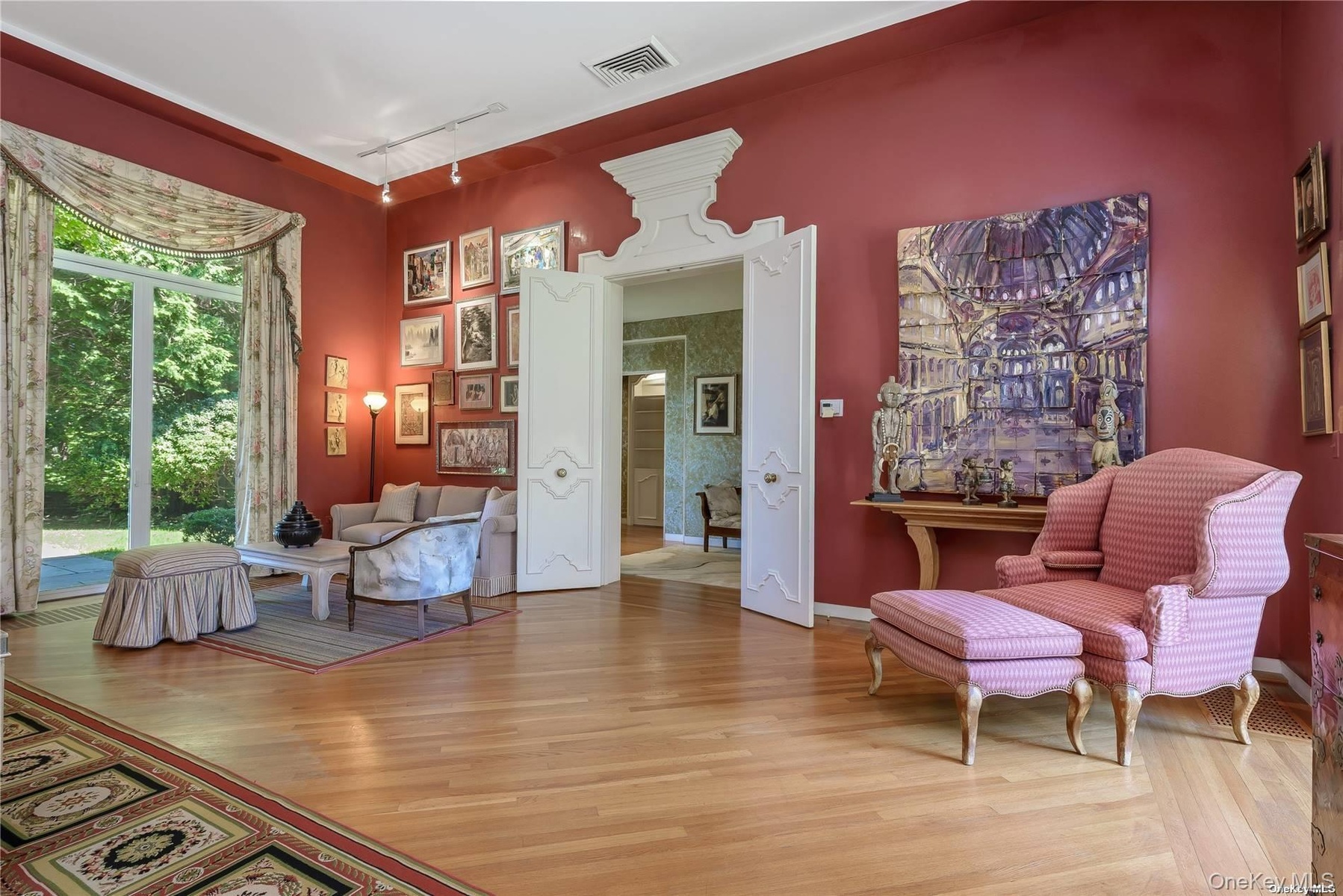 Living Room with Doors to the Patio and Bedrooms