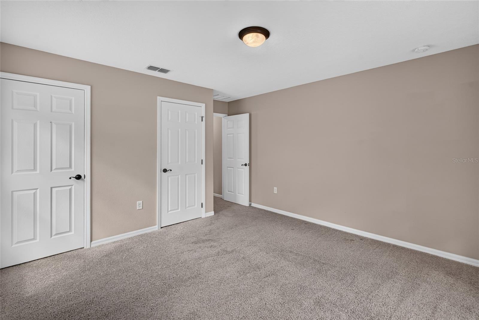 Bedroom with 2 Walkin Closets