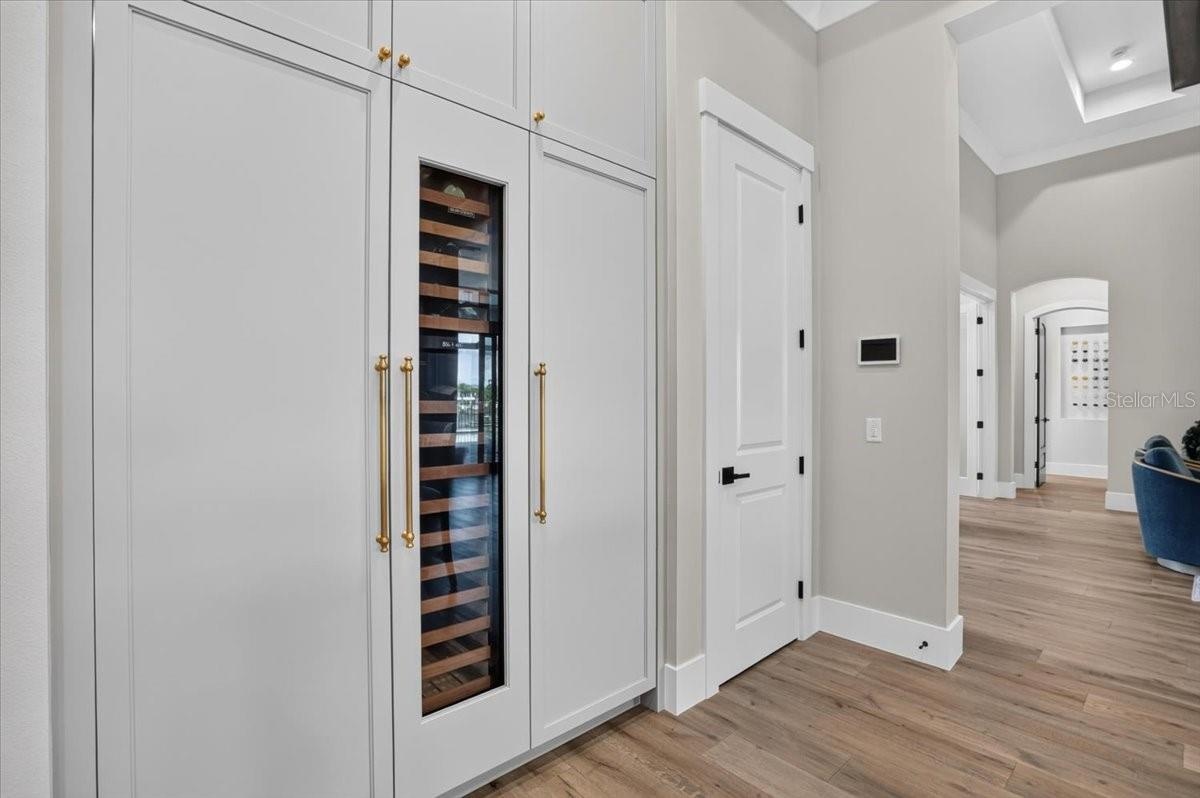 Sub Zero Freezer (left) Wine Fridge (center) Refrigerator (right)