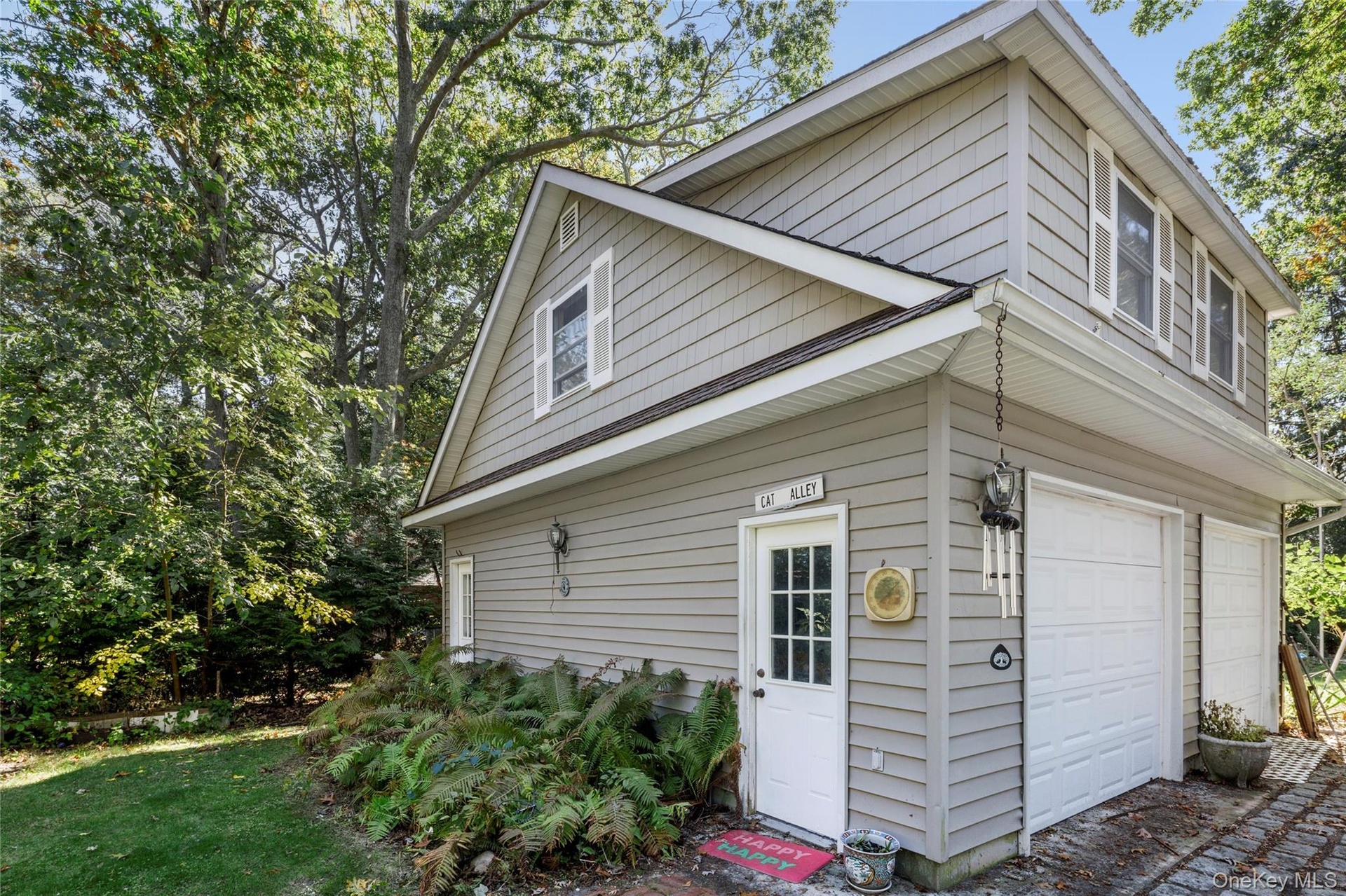 Garage with an upstairs bonus room.