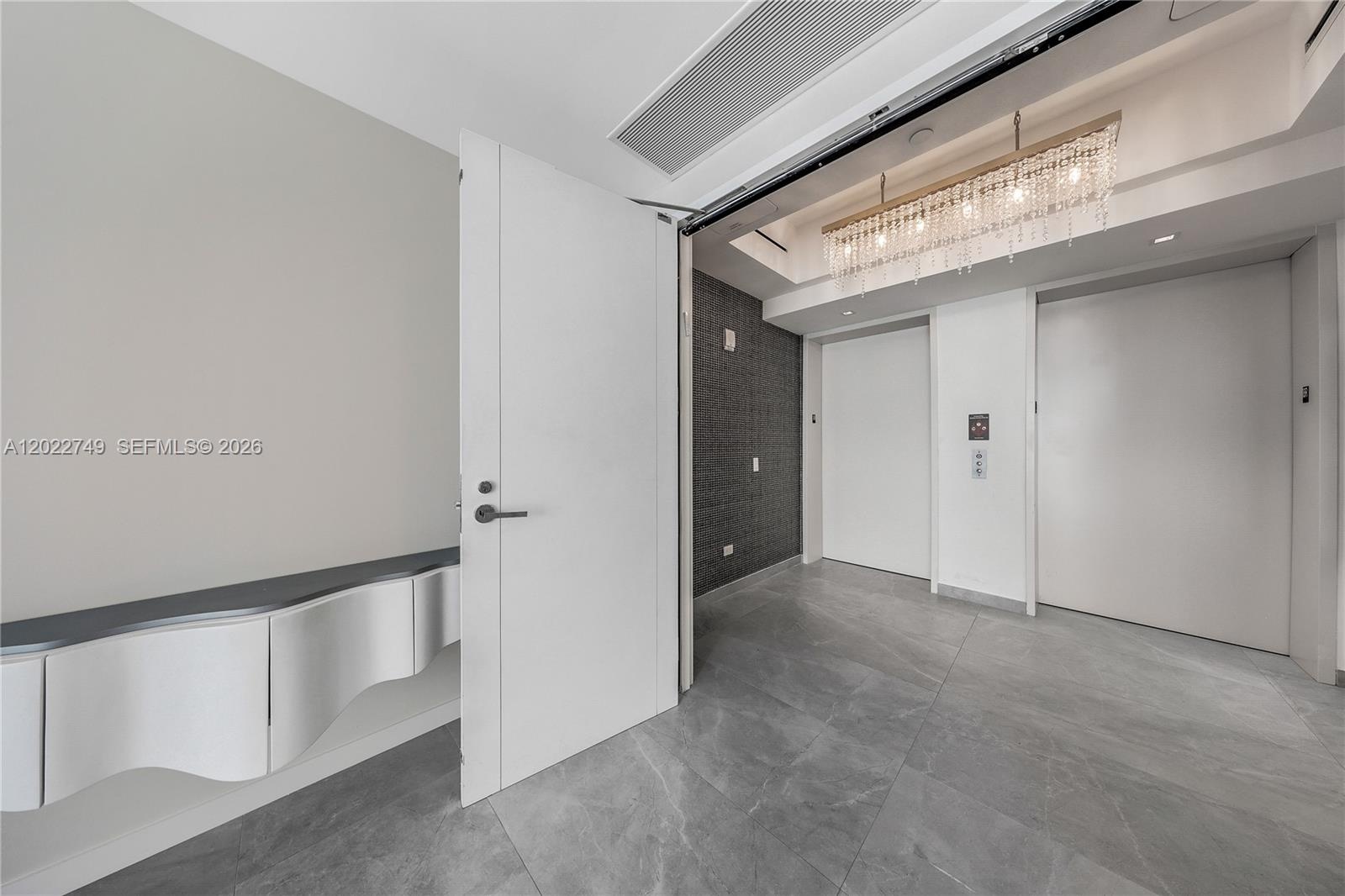 2 Elevators to a private foyer, double doors entrance