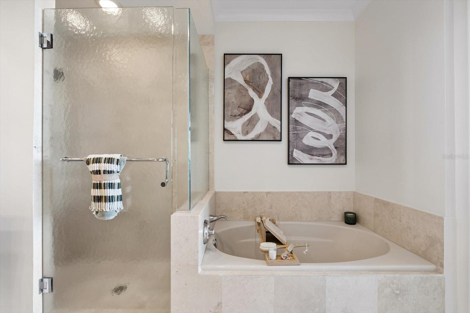 Primary ensuite bathroom with separate shower & garden soaking tub