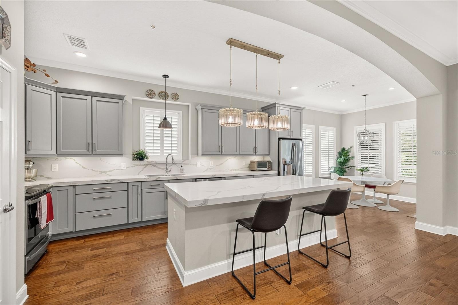 Renovated Kitchen with Custom Cabinetry and Quartz Countertops