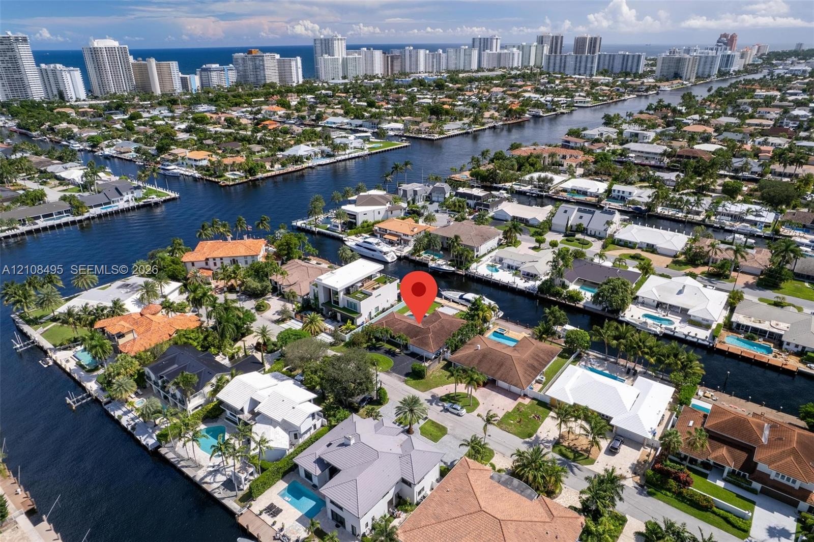 Waterfront property with direct canal access situated in a coastal residential setting