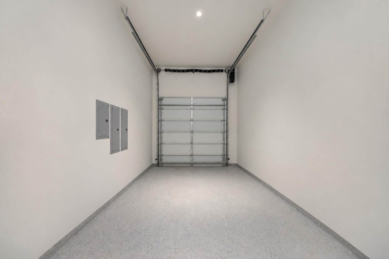 custom color 2 part garage epoxy- double height to put car lift