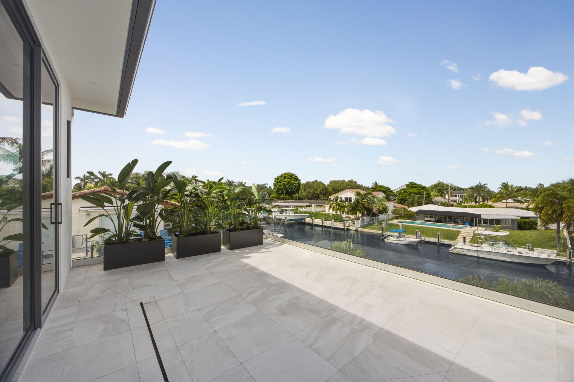 Primary Giant Private Balcony with impact glass railing