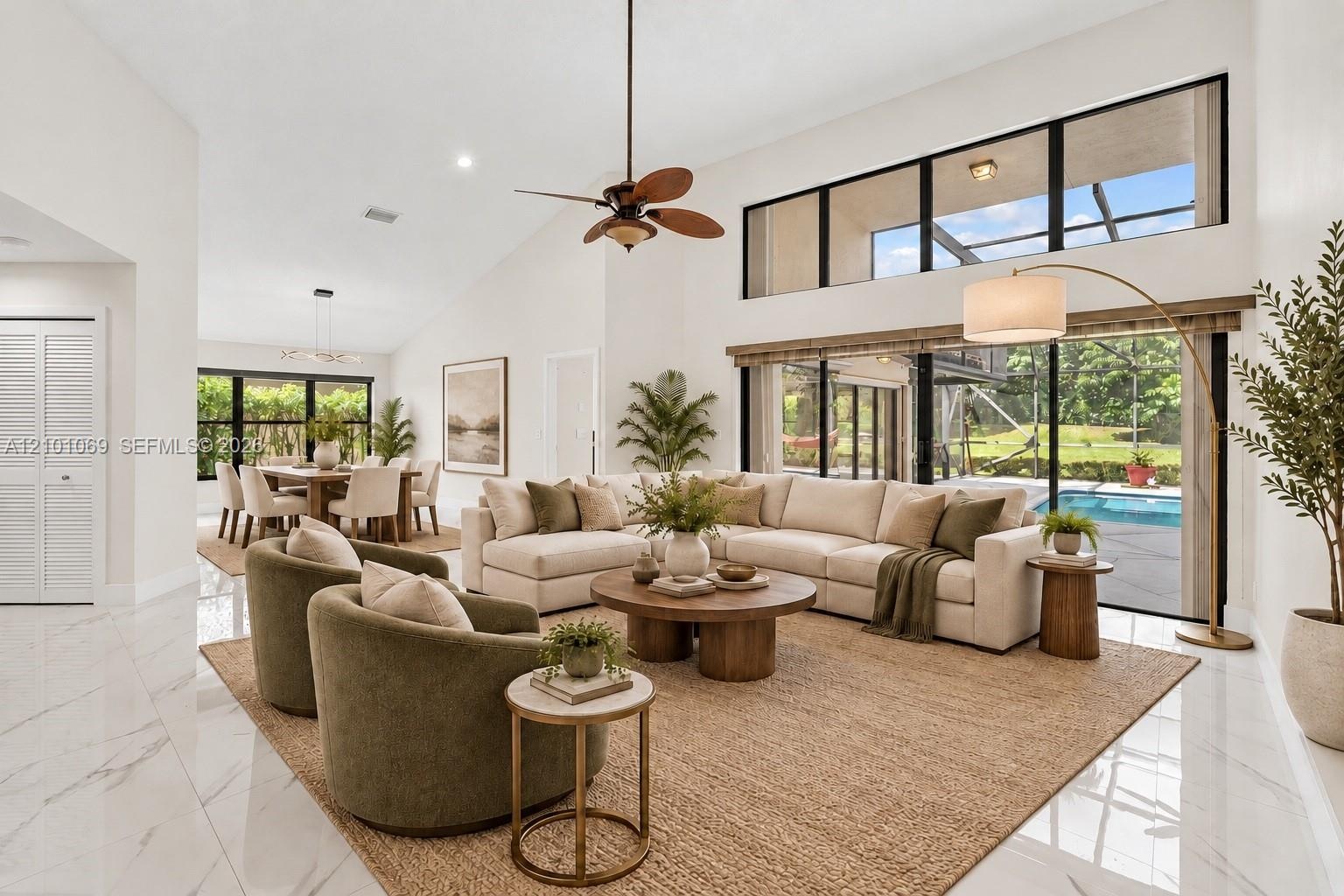 Large porcelain flooring throughout, open, airy with natural light. Separate dining room- virtually staged