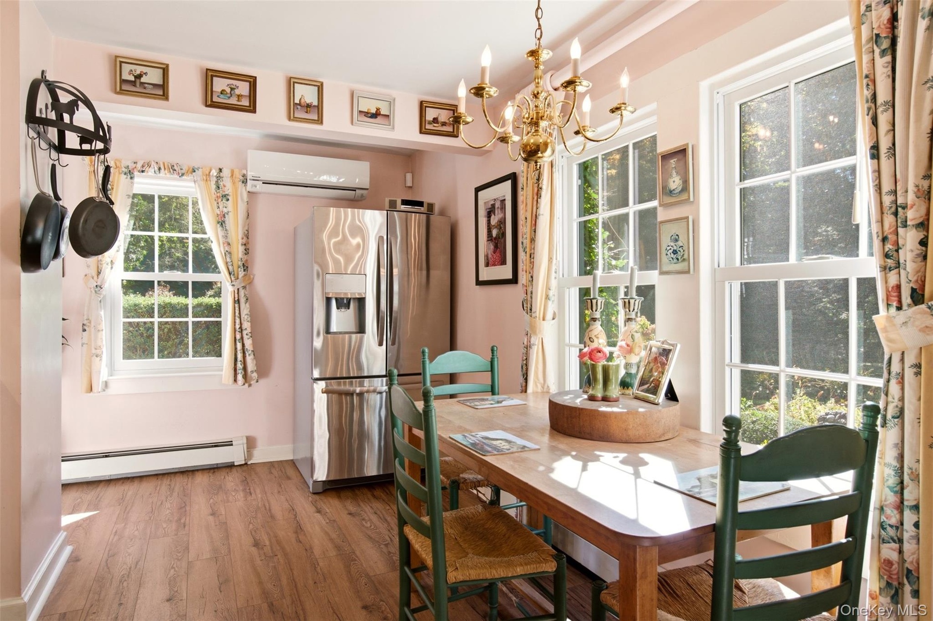 Eat-in kitchen leads to laundry room