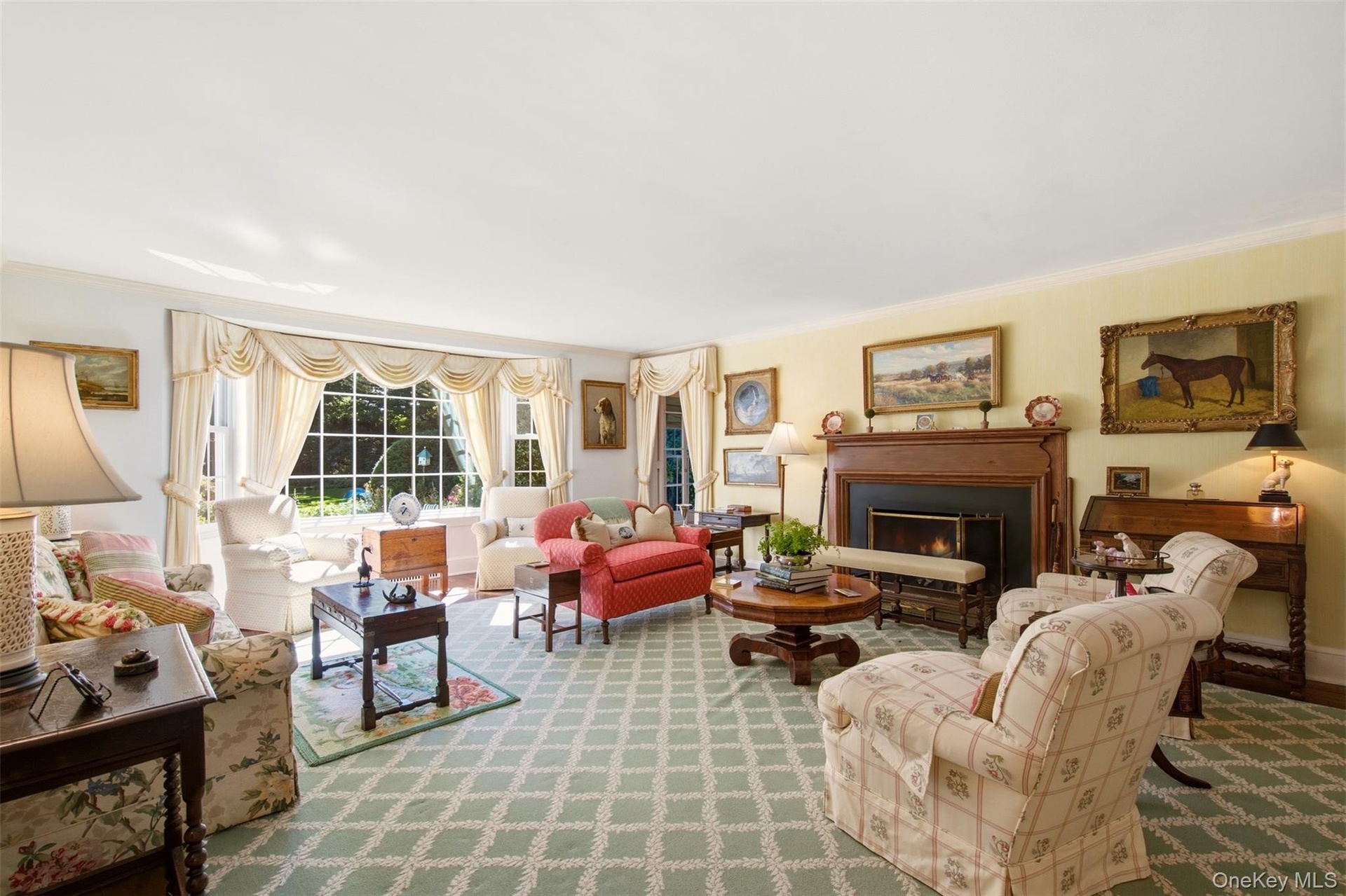 Formal living room with wood burning fireplace