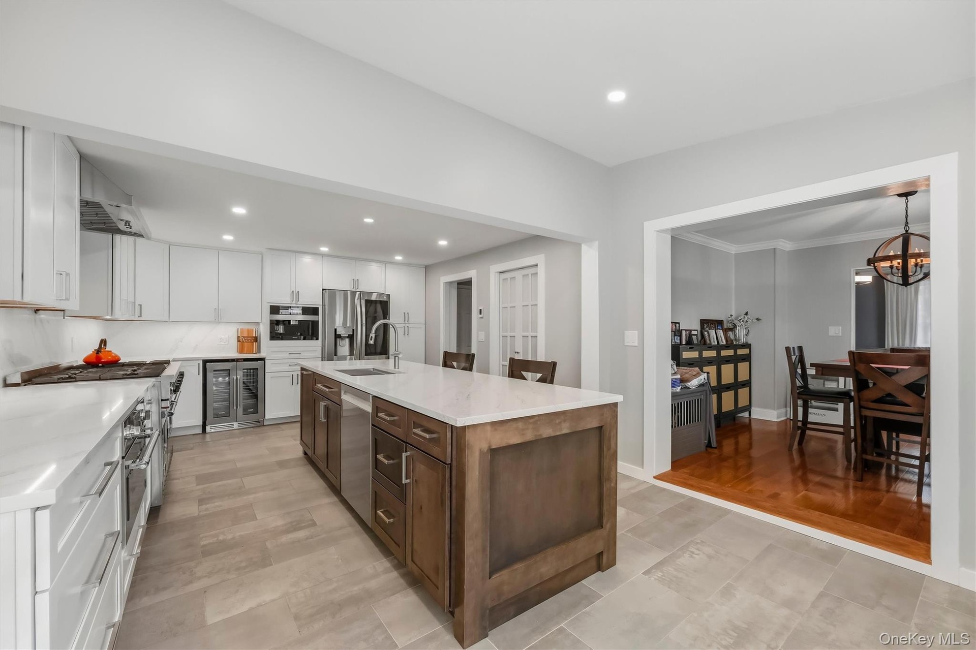 Alternate view of the kitchen workspace highlighting the efficient design and easy access to the main living areas.