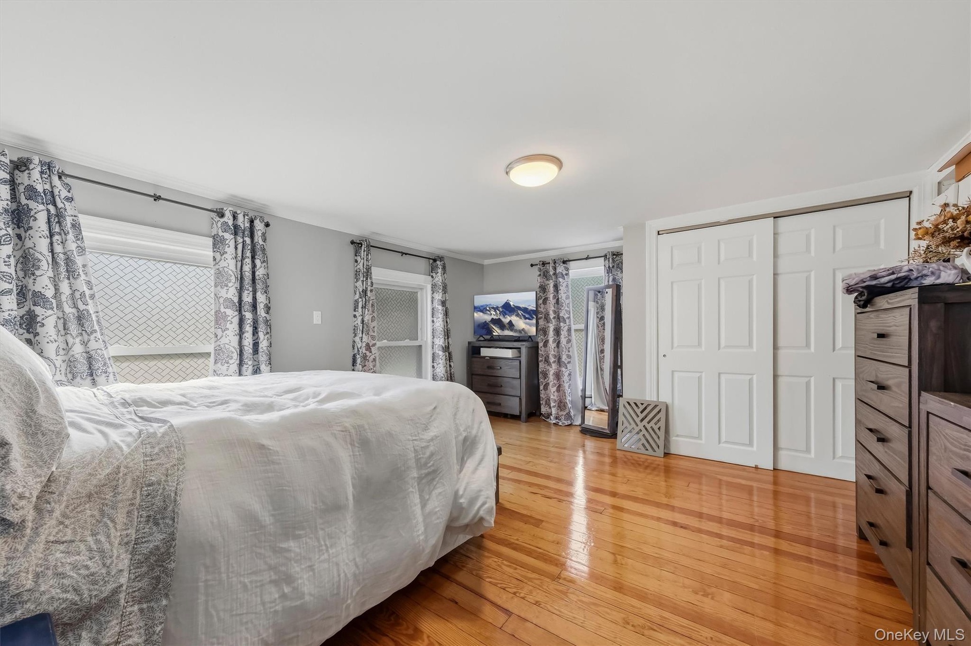 Well-proportioned secondary bedroom offering flexible space