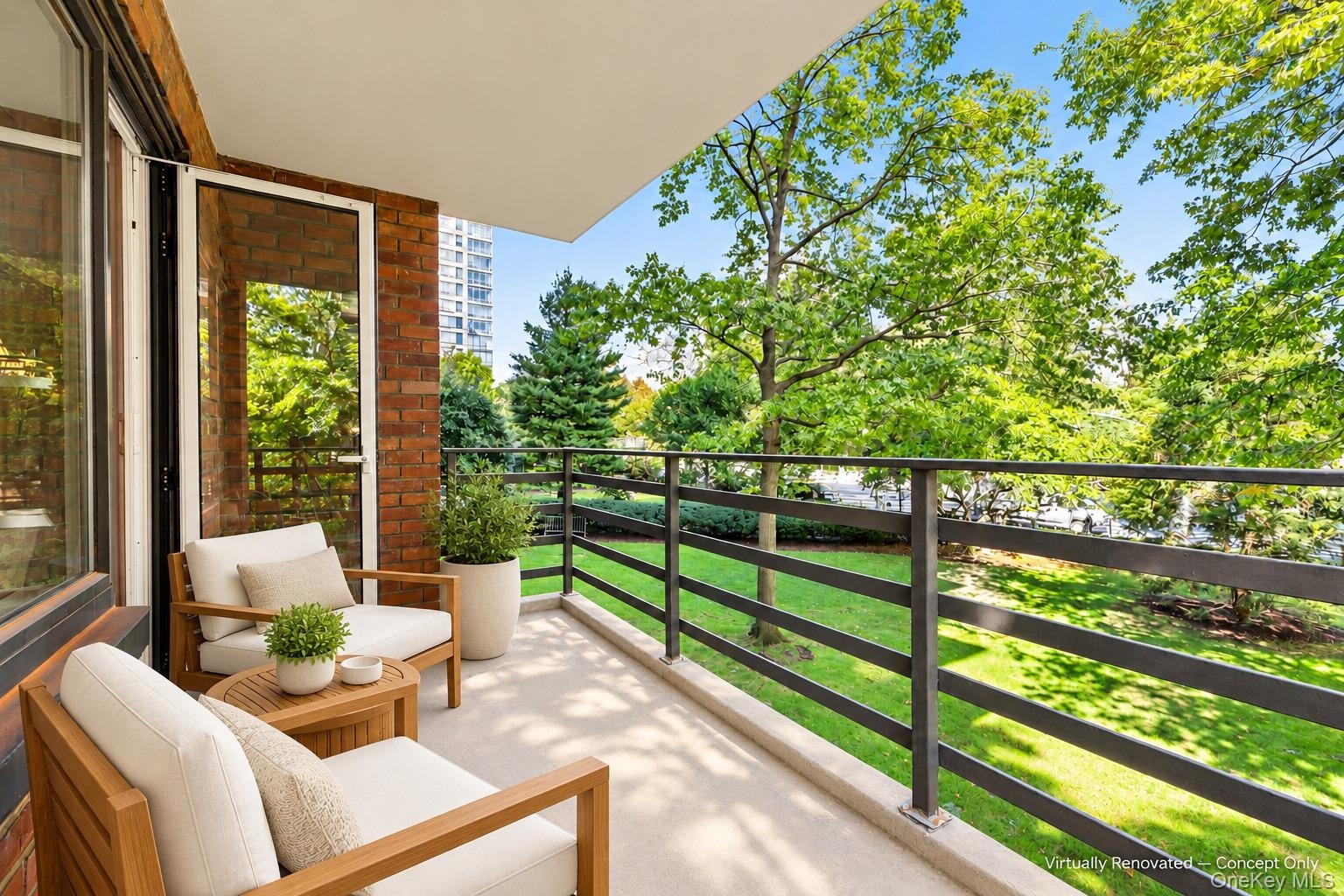 Covered balcony featuring exposed brick wall, concrete flooring, and horizontal metal railing