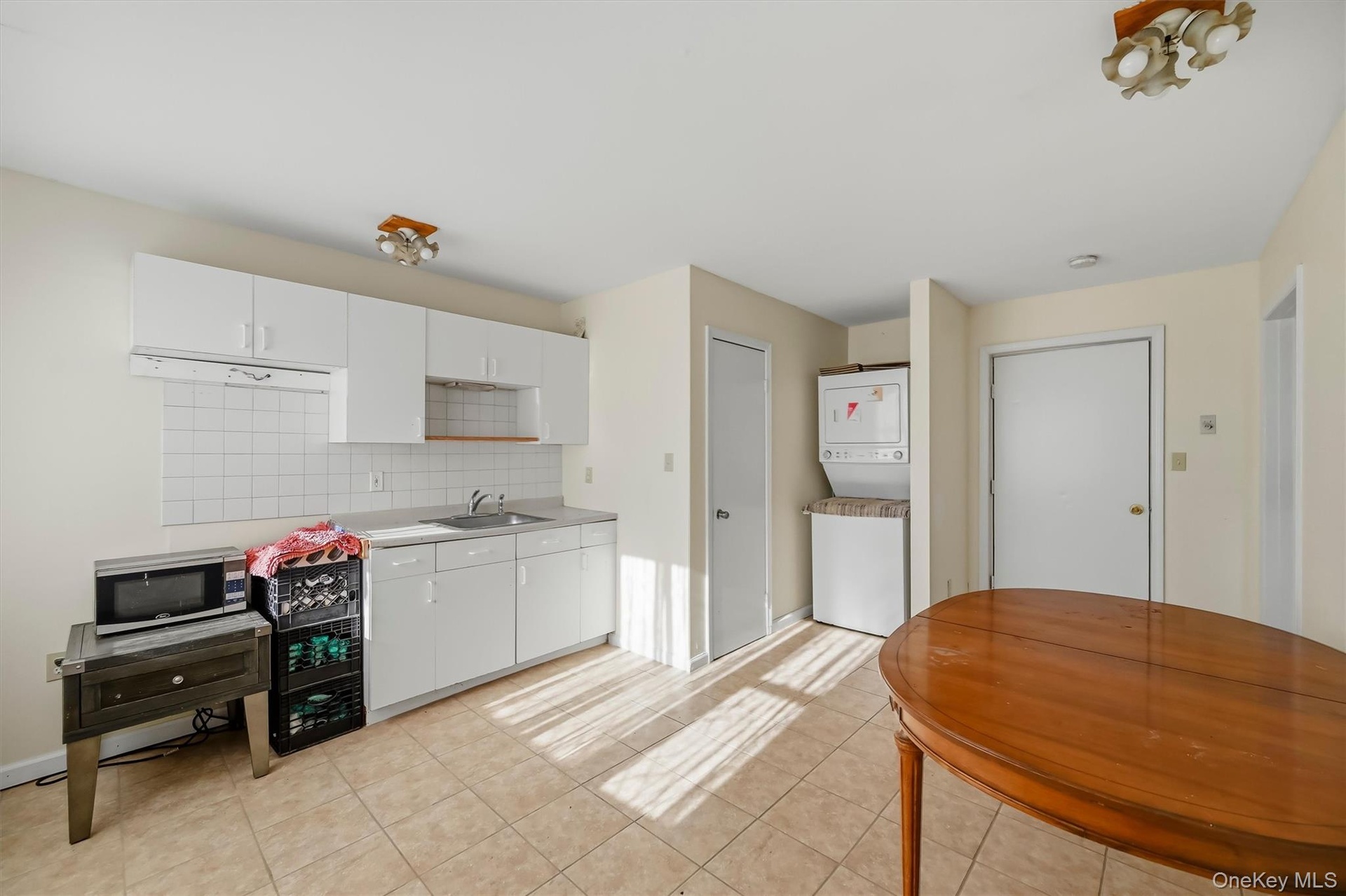 Staff Apartment #1 – Kitchen & Laundry Area