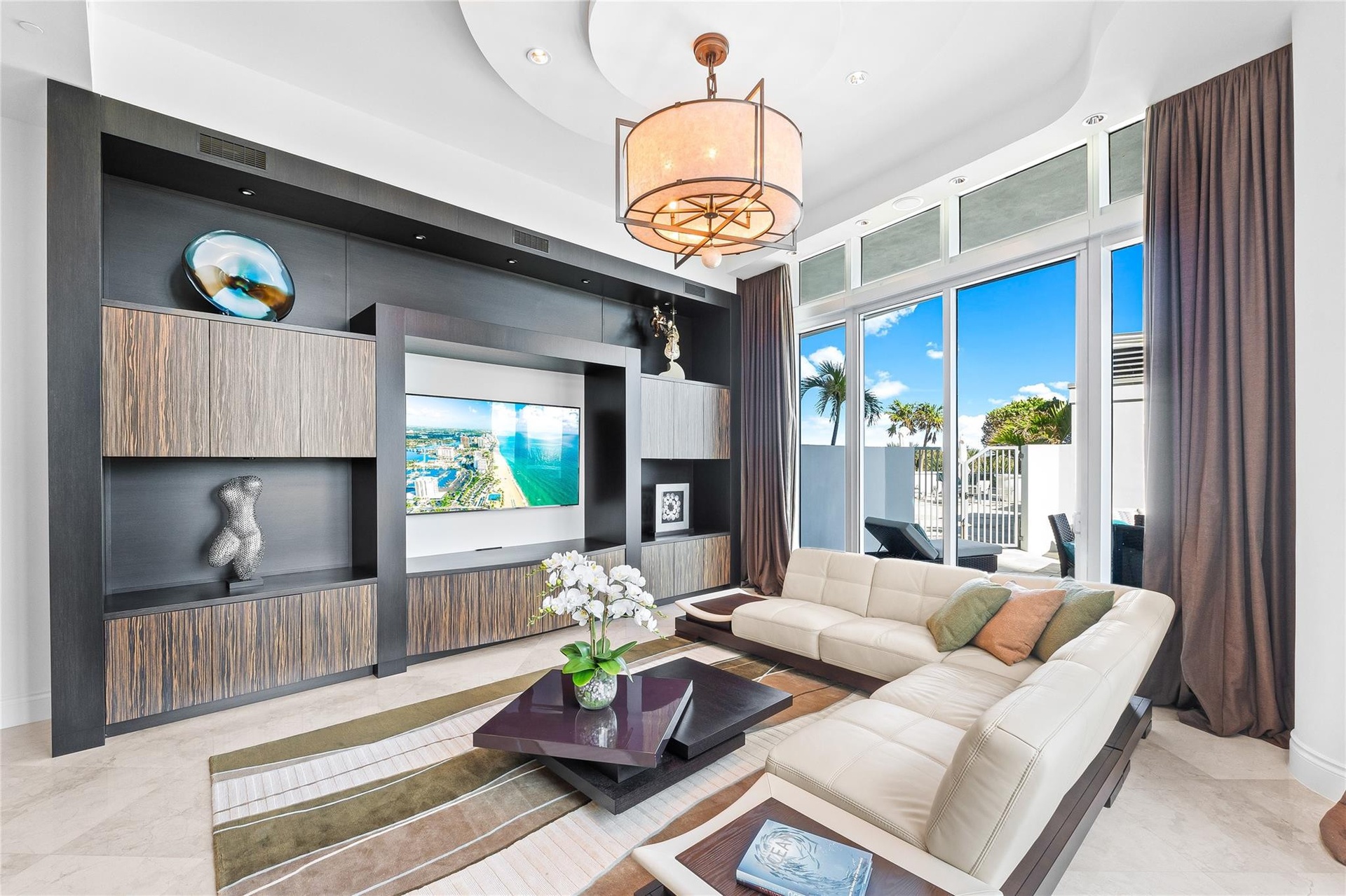 2nd Living Space leads to Lanai Terrace, Pool & Beach.