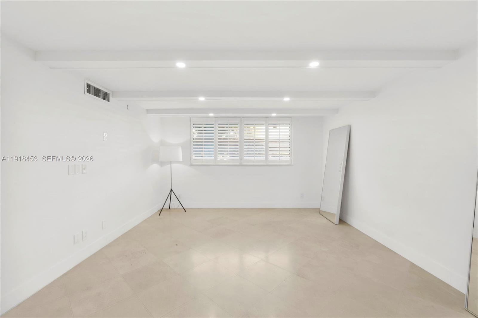 CLOSETS ON BOTH SIDES OF HALLWAY TO MASTER BEDROOM