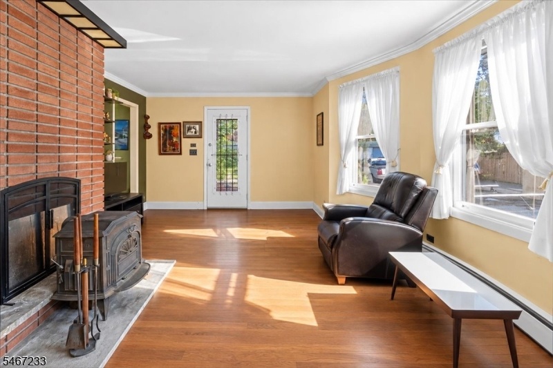 Living Room w/ Brick Hearth