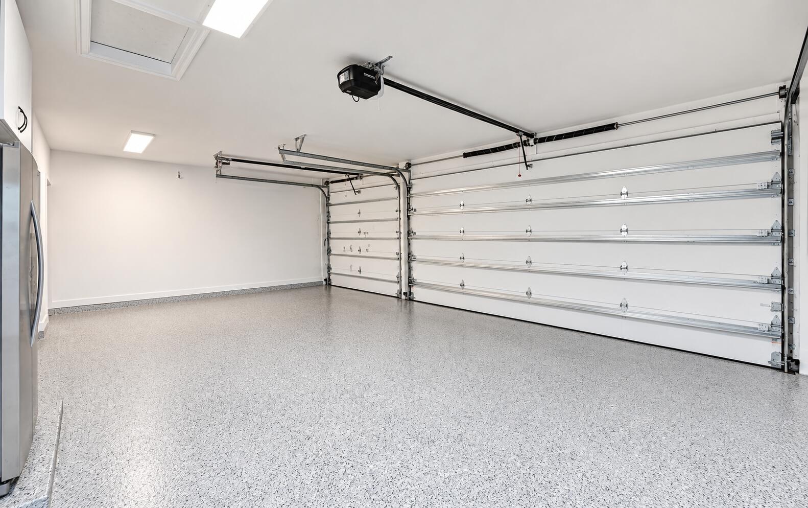 New epoxy floors, newly installed impact garage doors and remoteless garage door openers.