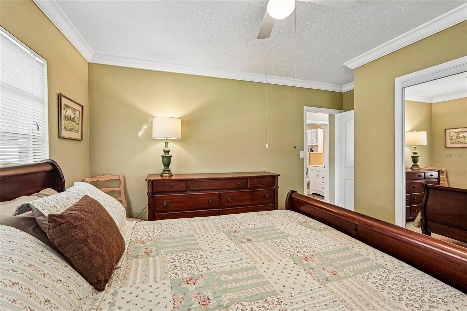 309 primary bedroom, with mirrored closet