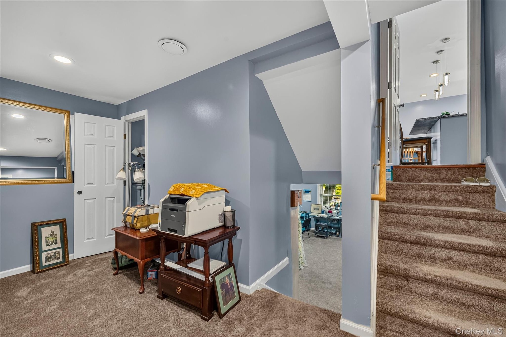 This is a great spot to add a desk, treadmill, yoga mat, or place your own creative touch here.  It is the transition area between floors