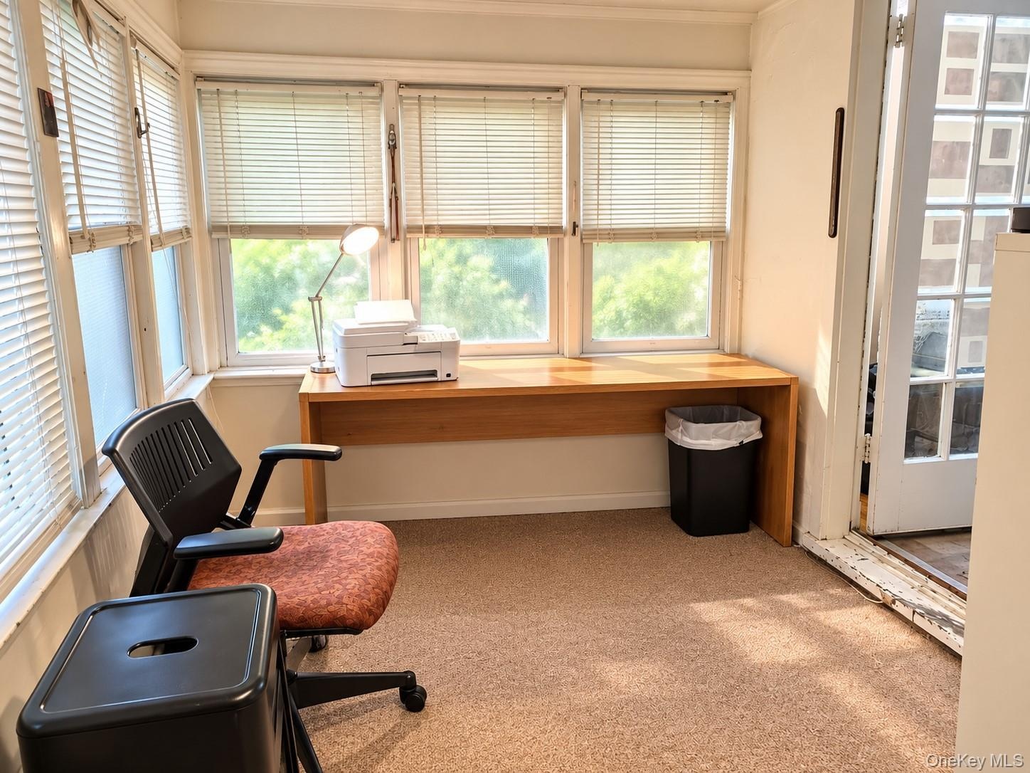 2nd view of enclosed porch off living room