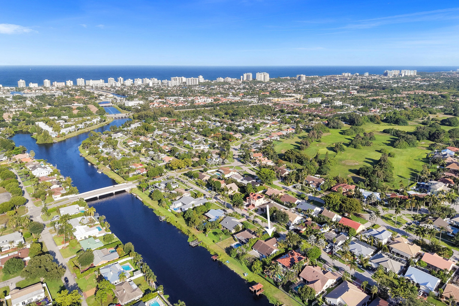 Neighborhood overview. Inland canal with fixed bridges and no ocean access.