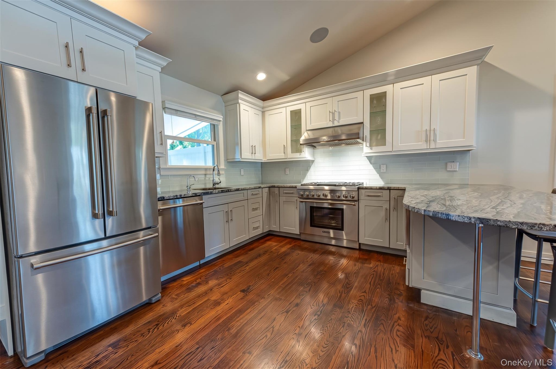 White and Bright! Stainless Appliances and Granite Countertops. New Refrigerator.